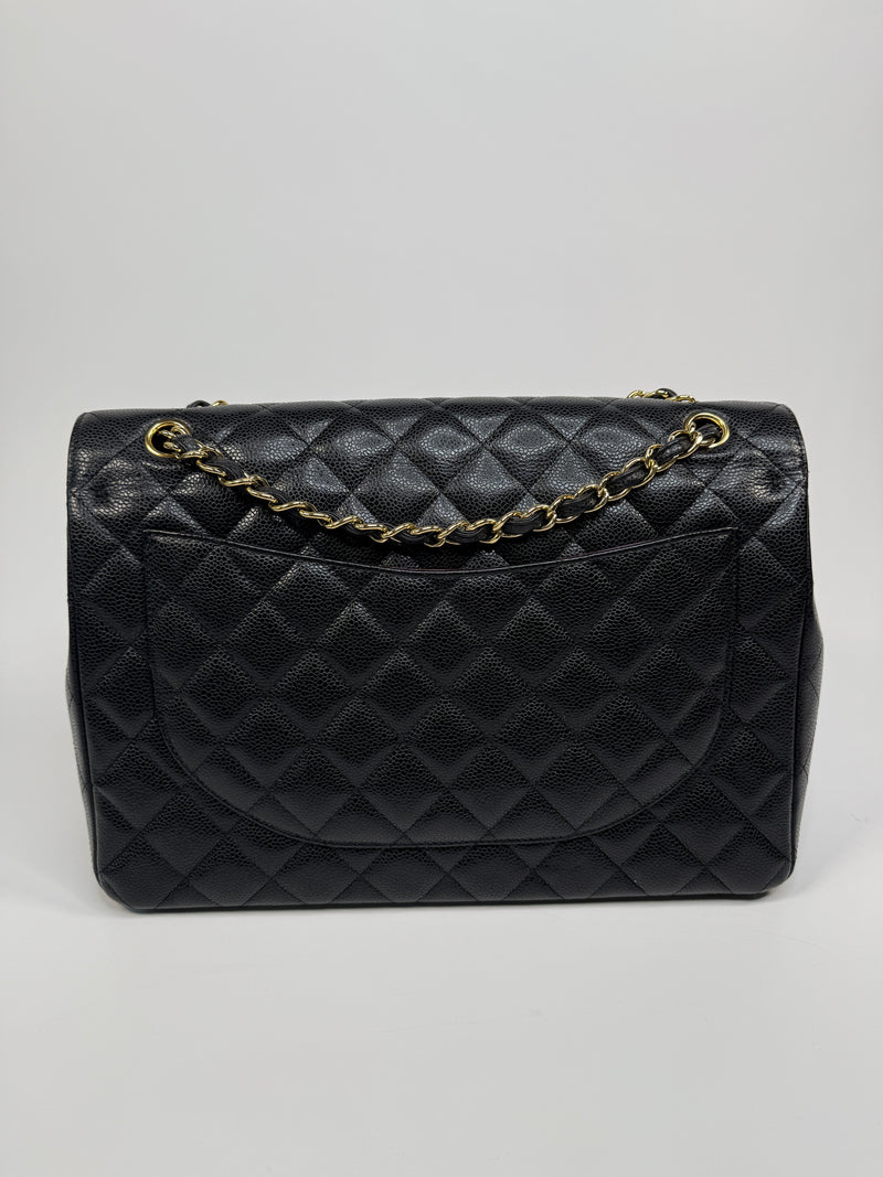 Chanel Maxi Classic Double Flap In Black Caviar Leather With GHW