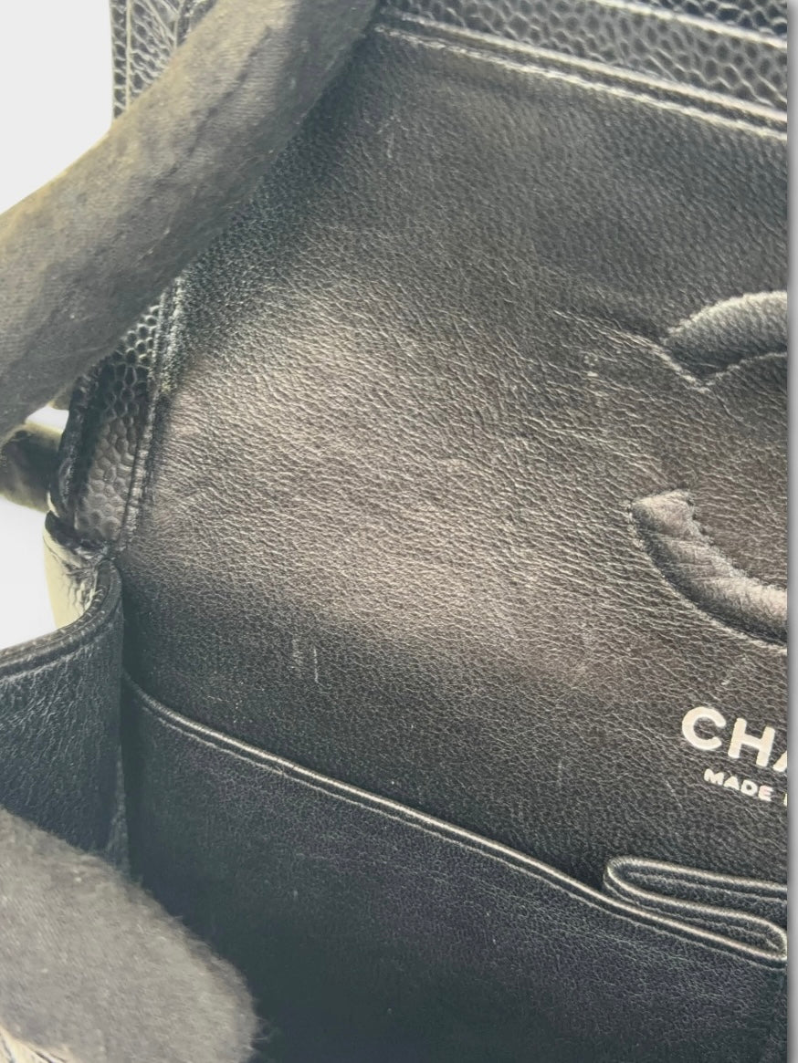 Chanel Vintage Small Classic Double Flap In Black Caviar Leather With Silver Hardware. 100% authentic and preloved in excellent condition