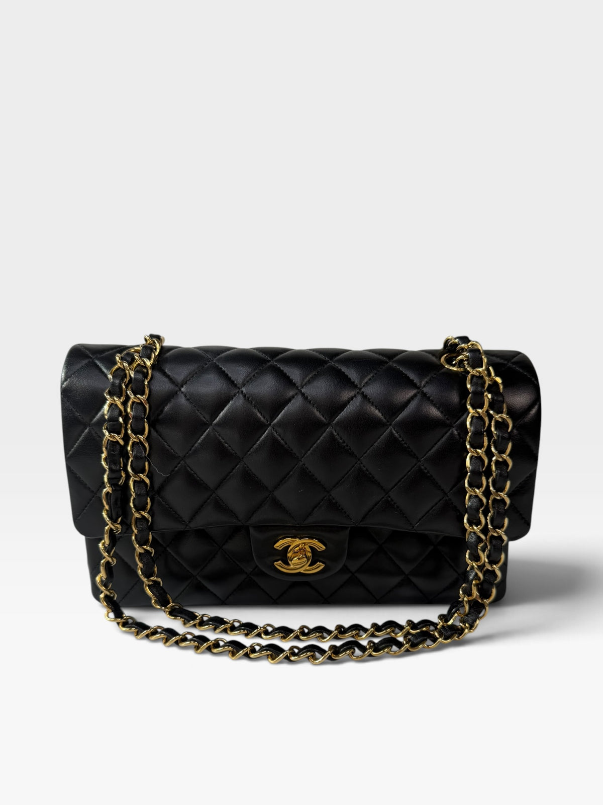 Chanel Medium Classic Double Flap In Black Lambskin Leather Gold Hardware. 100% authentic and preloved in excellent condition 