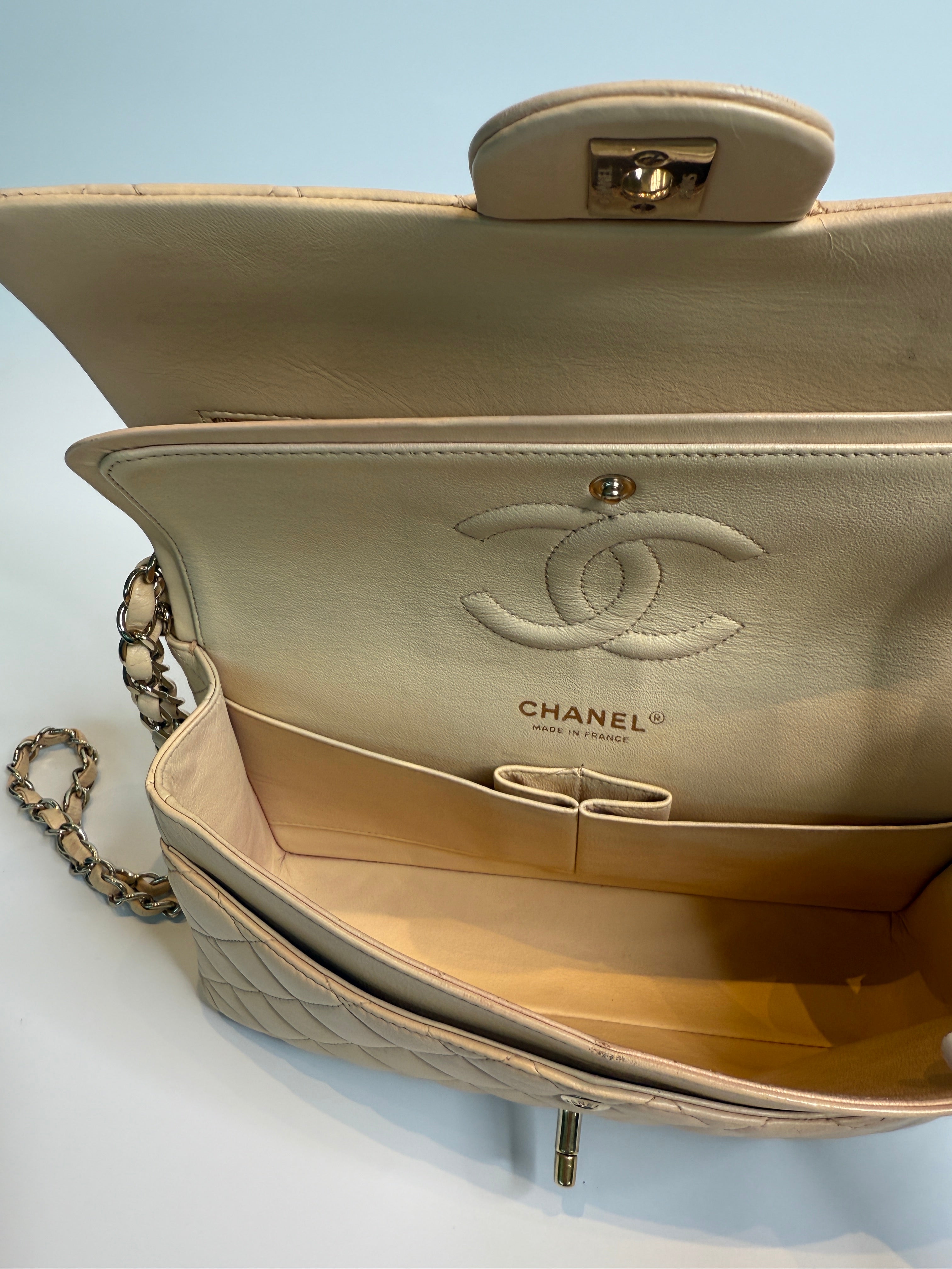 Chanel Medium Classic Double Flap Beige Lambskin Leather With Gold Hardware
Pre Loved & Authentic 
