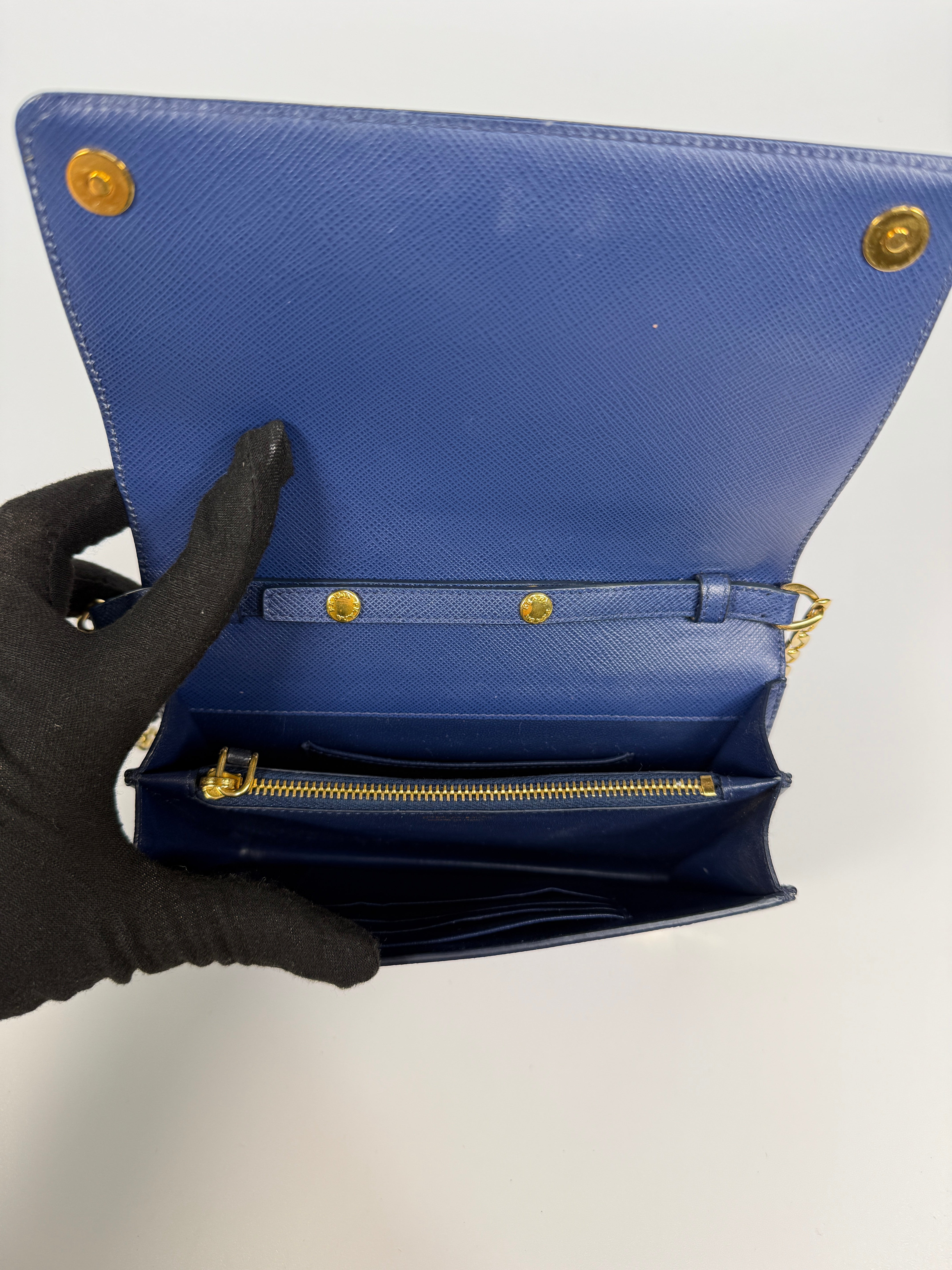Authentic and preloved Prada Wallet Chain Bag In Blue Saffiano Leather With Gold Hardware. Very Good condition. 100% Authenticity guarantee 