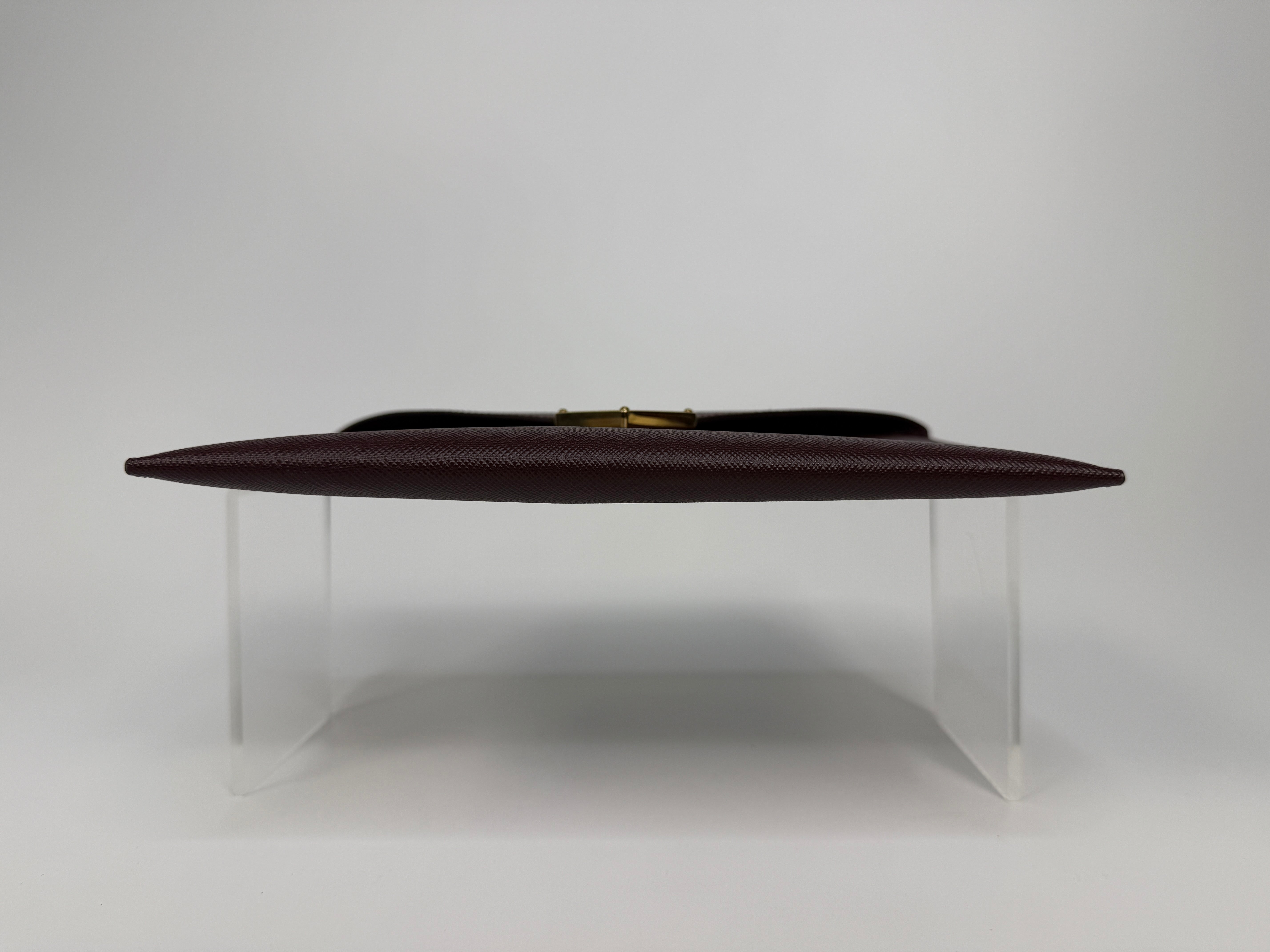 Prada Clutch In Burgundy Saffiano Leather With Gold Hardware