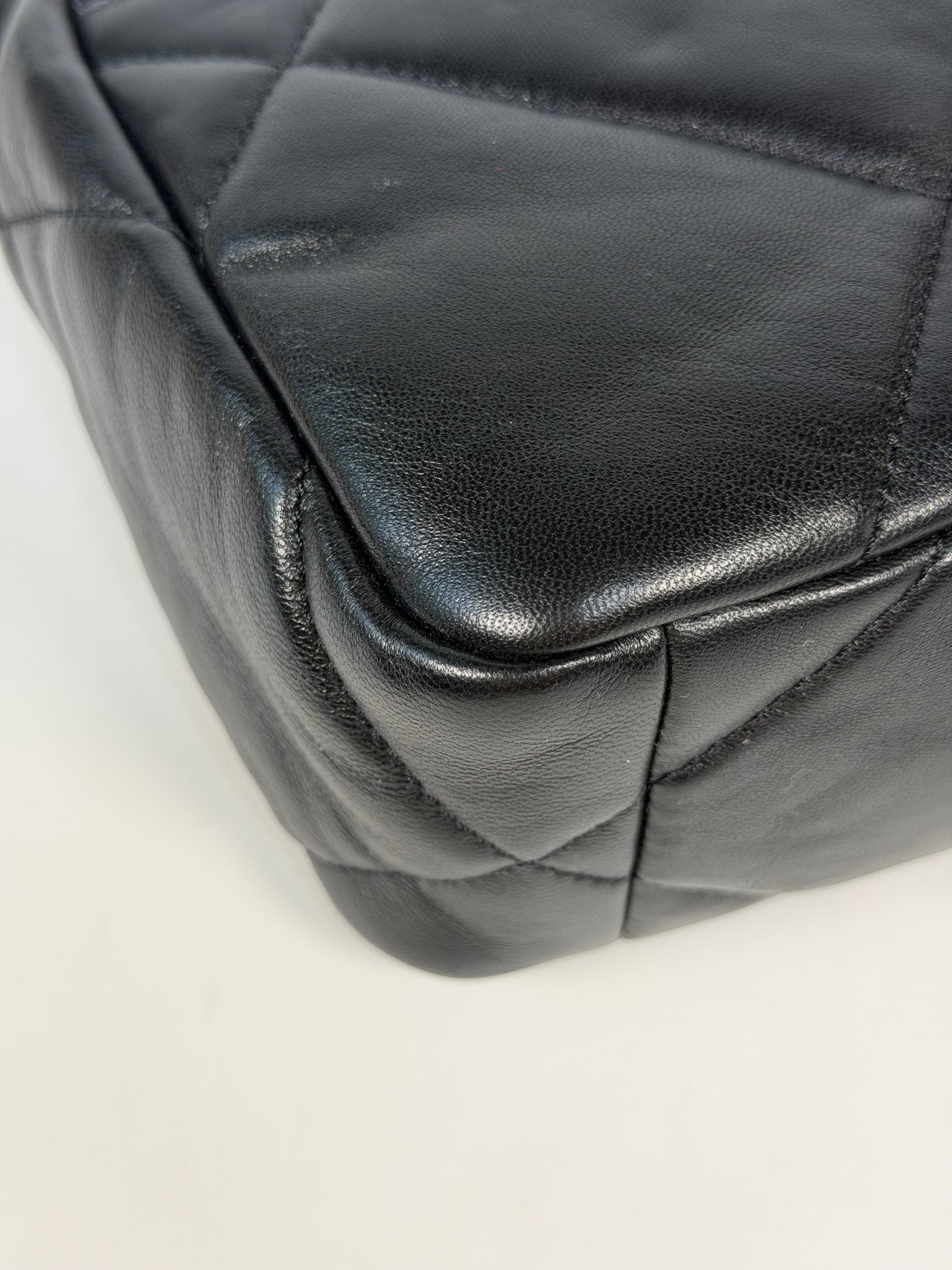 Chanel 19 Small In Black & White Leather With Mixed Hardware. Authentic and preloved in excellent condition. Verified by Luxe Cheshire.
