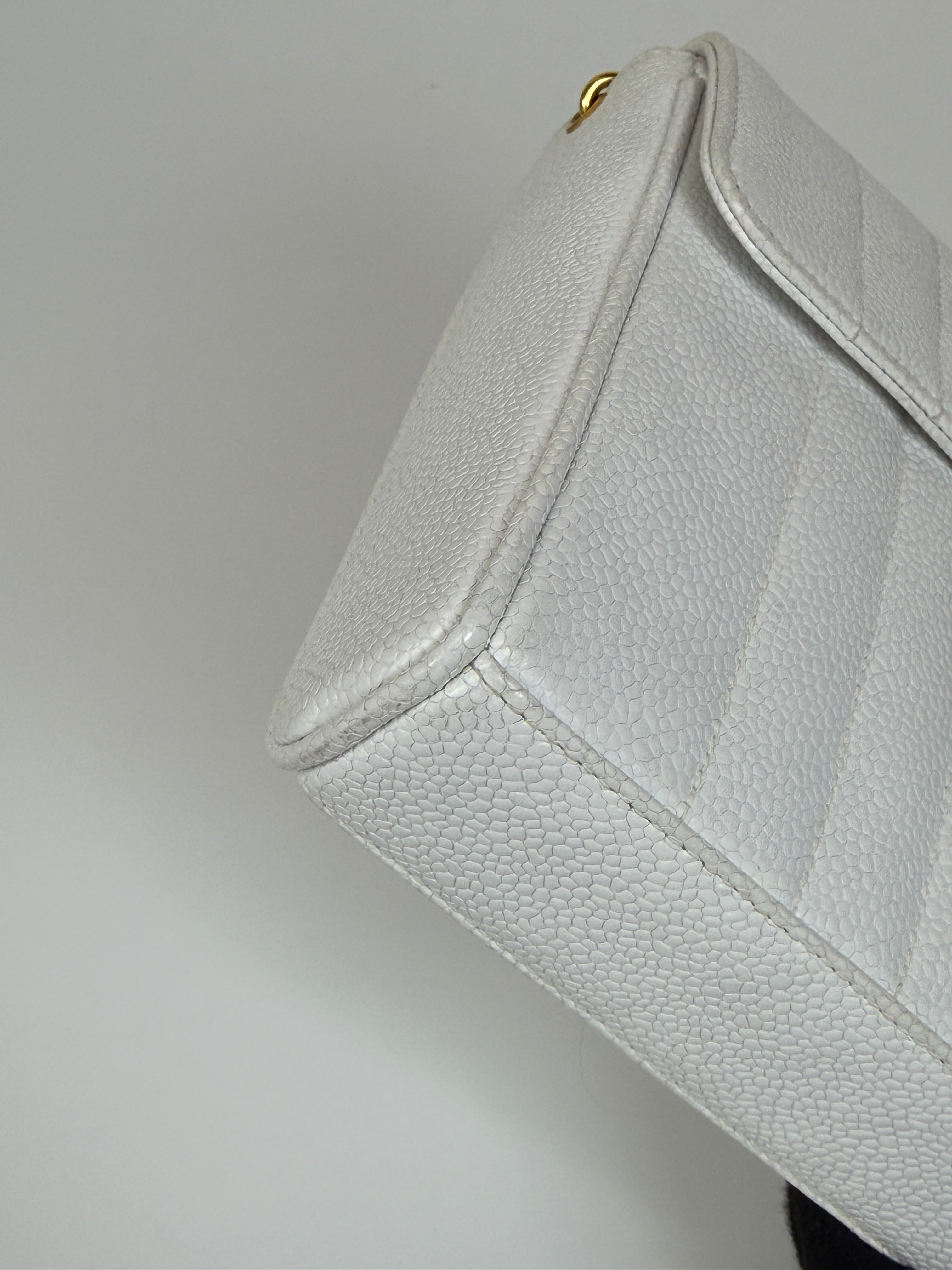 Chanel Vintage Mini Square Flap In White Caviar Leather With 24kt Gold Hardware. Excellent condition 100% Authenticity Guarantee 