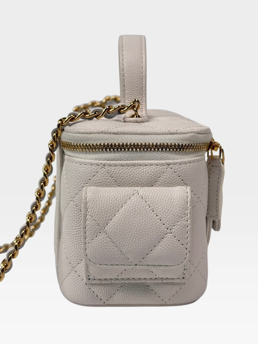Chanel Vanity Top Handle  Multi Pockets In White Caviar Leather With Gold Hardware. 100% authentic and preloved in excellent condition