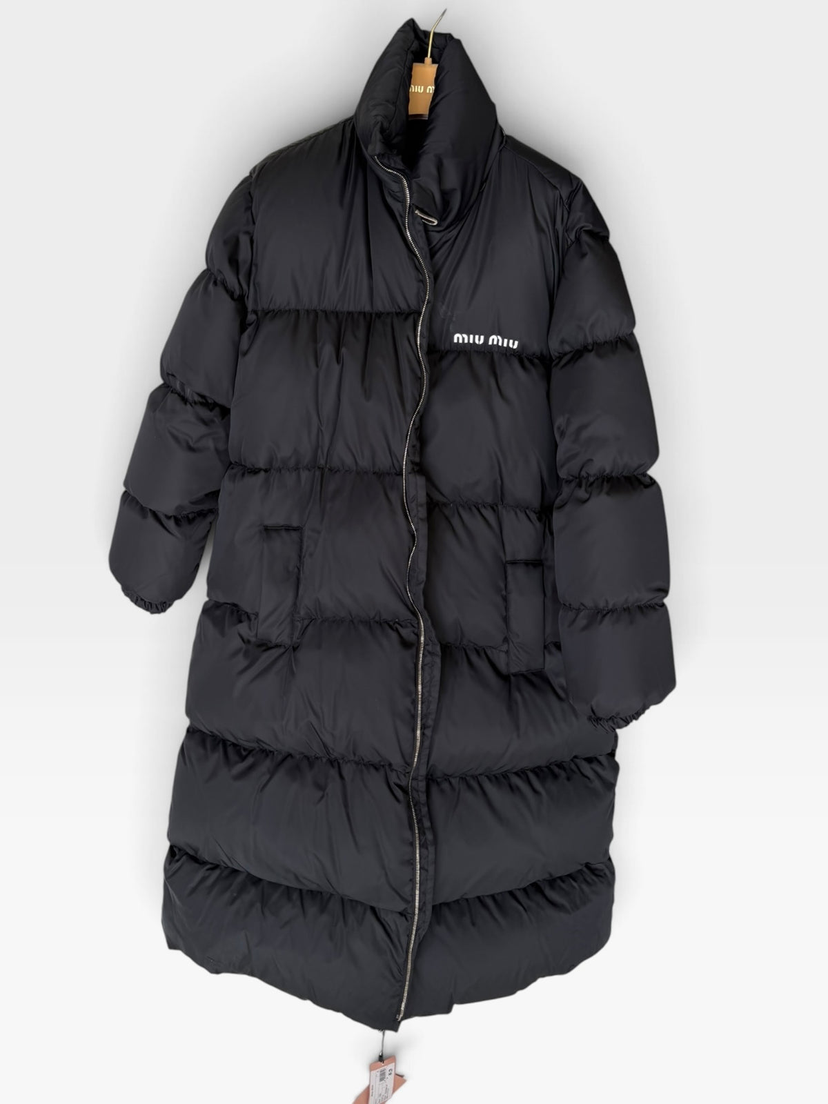 Miu Miu Long Puffer Coat In Black (Size 42/UK10). 100% authentic and preloved in excellent condition