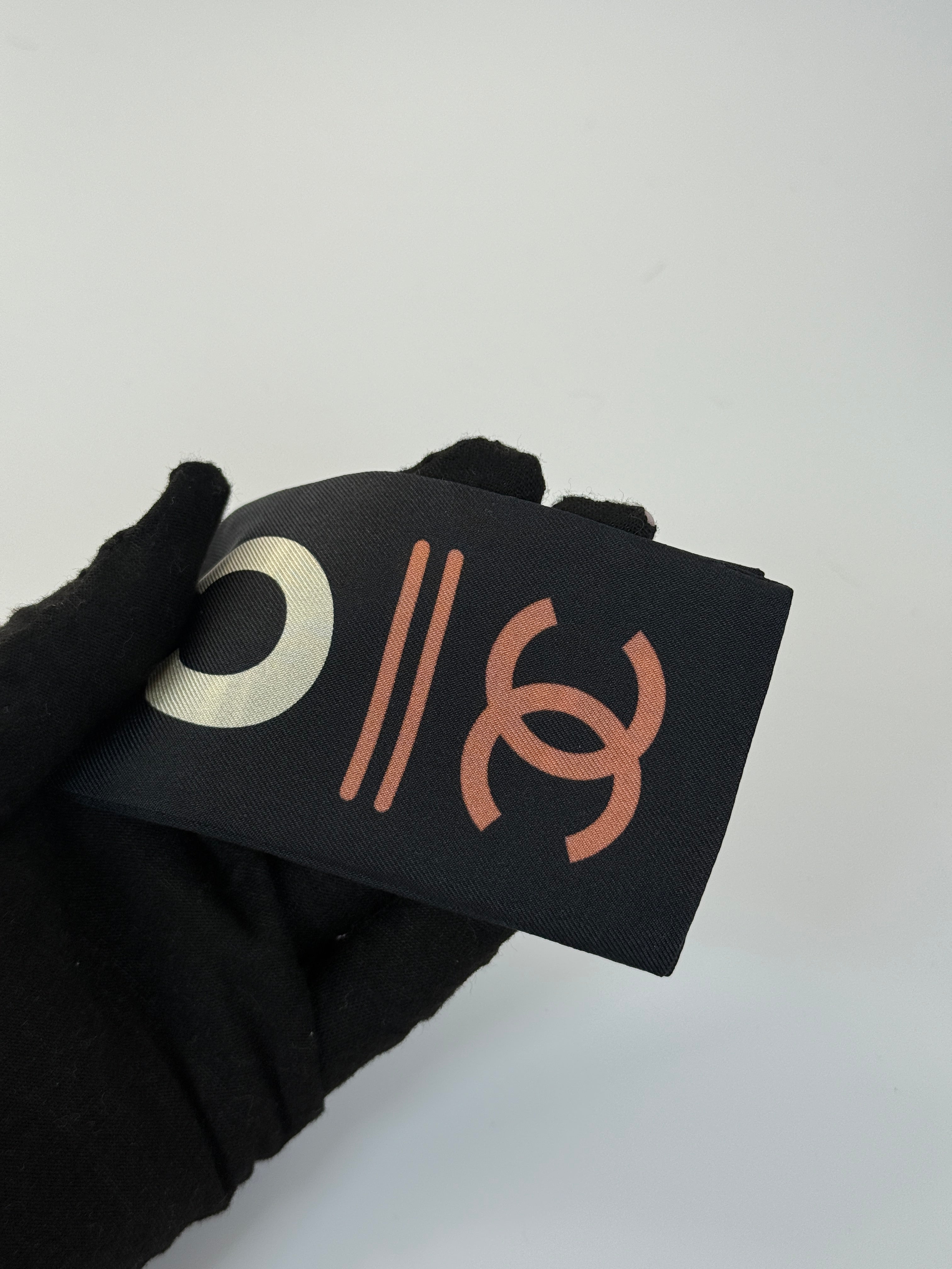 Authentic and preloved Chanel Twilly in black and orange. Excellent condition. 100% Authenticity Guarantee 