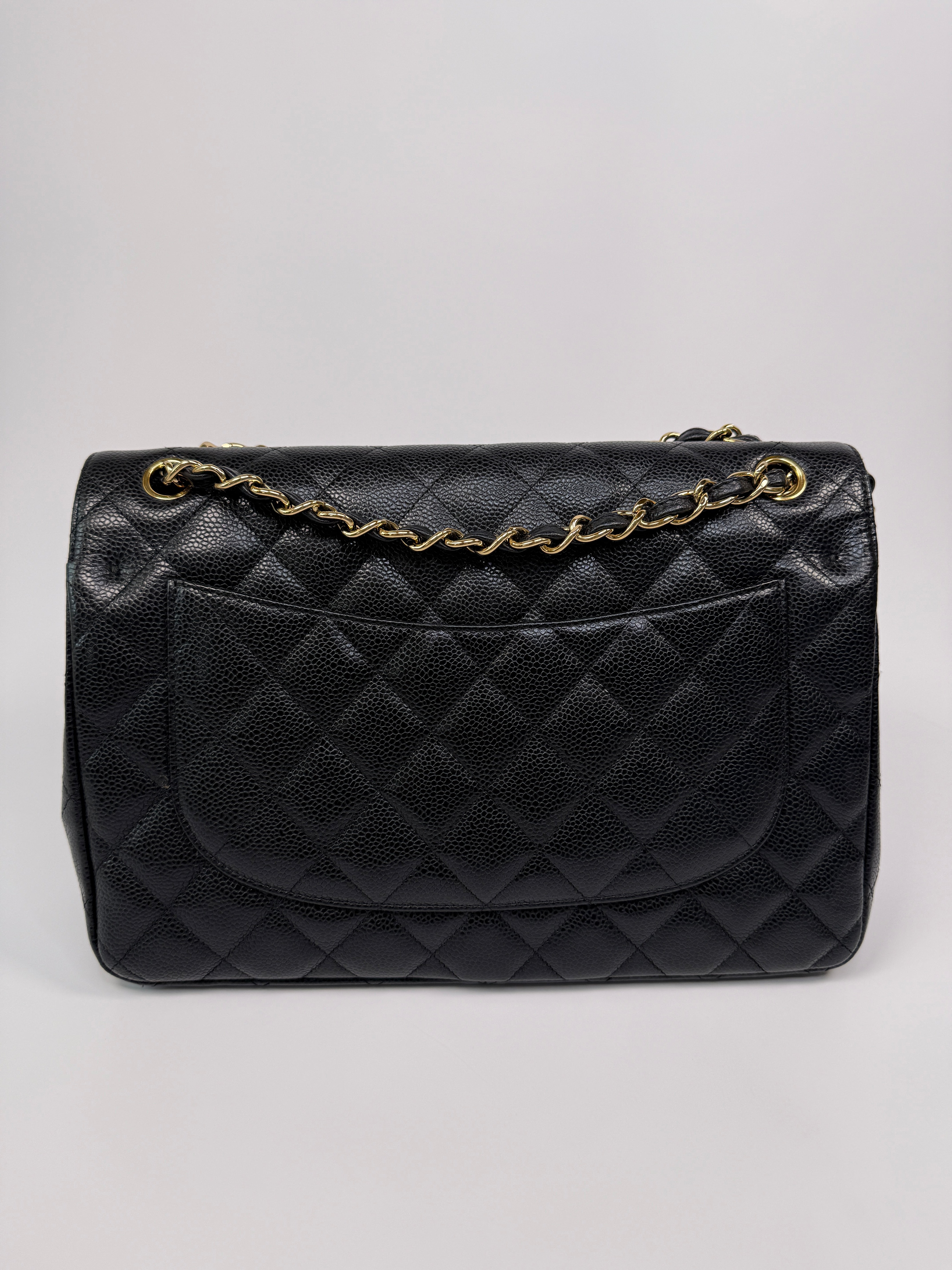 Chanel Classic Jumbo Flap Bag In Black Caviar LeatherWith Gold Hardware
Pre Loved & Authentic 