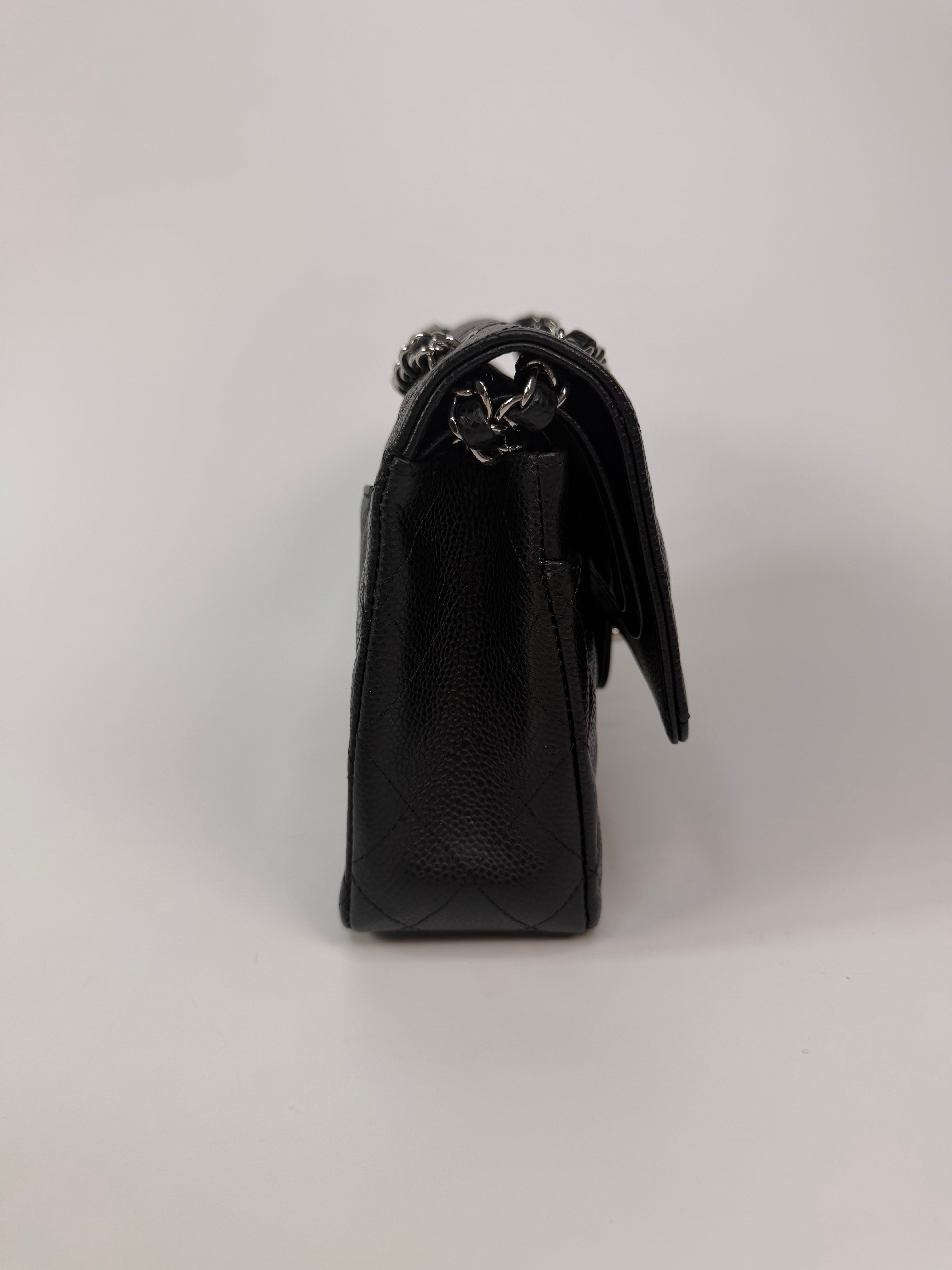 Chanel Vintage Medium Classic Double Flap Black Caviar Silver Hardware. 100% authentic and preloved in excellent condition