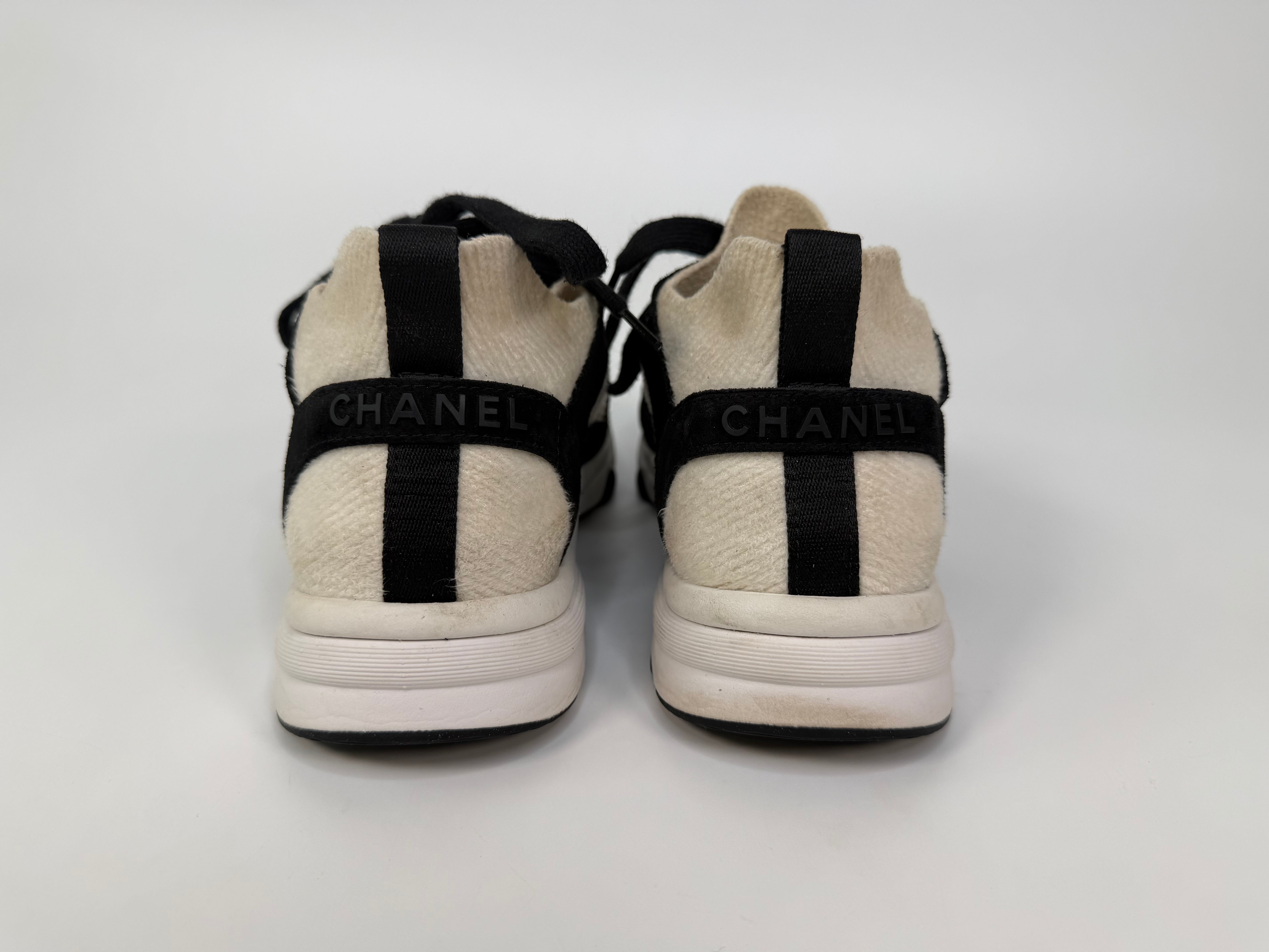 Chanel CC Knit Sneakers (Size 39/UK6). Authentic and preloved in very good condition.