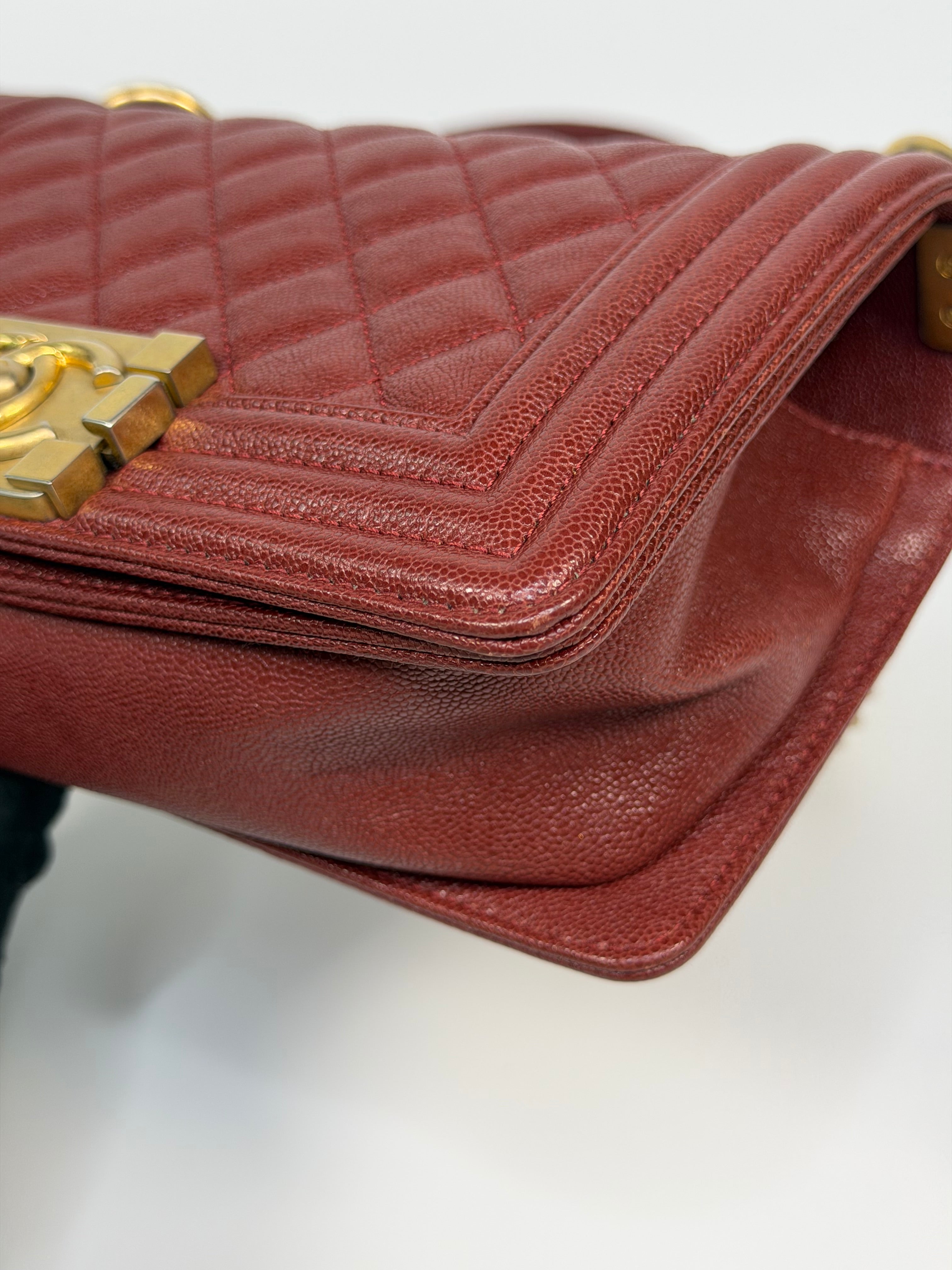 Chanel Le Boy Bag In Burgundy Caviar Leather Gold Hardware. Authentic and preloved in excellent condition.