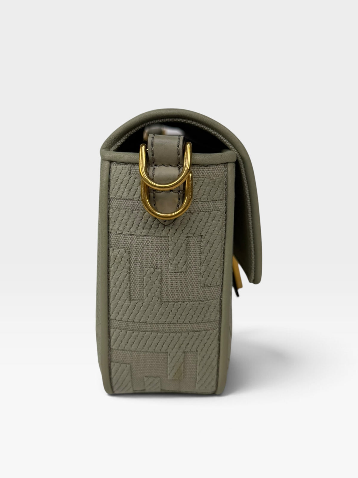 Fendi Baguette In Green Tea FF Monogram Fabric and Canvas With Gold Hardware. 100% authentic and preloved in excellent condition