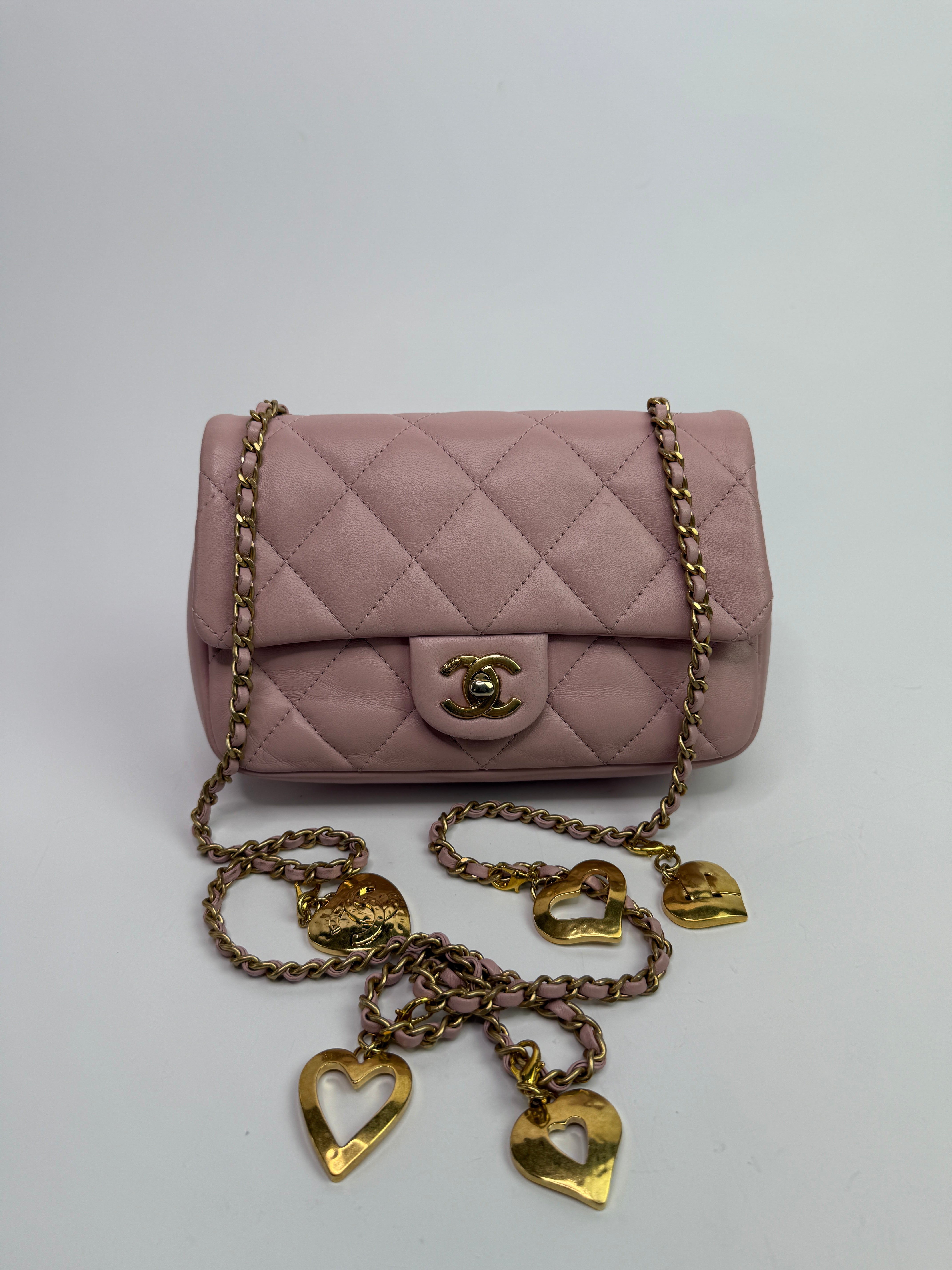 Chanel Mini Heart Charms Flap Antique Gold Hardware
Pre Loved & Authentic 