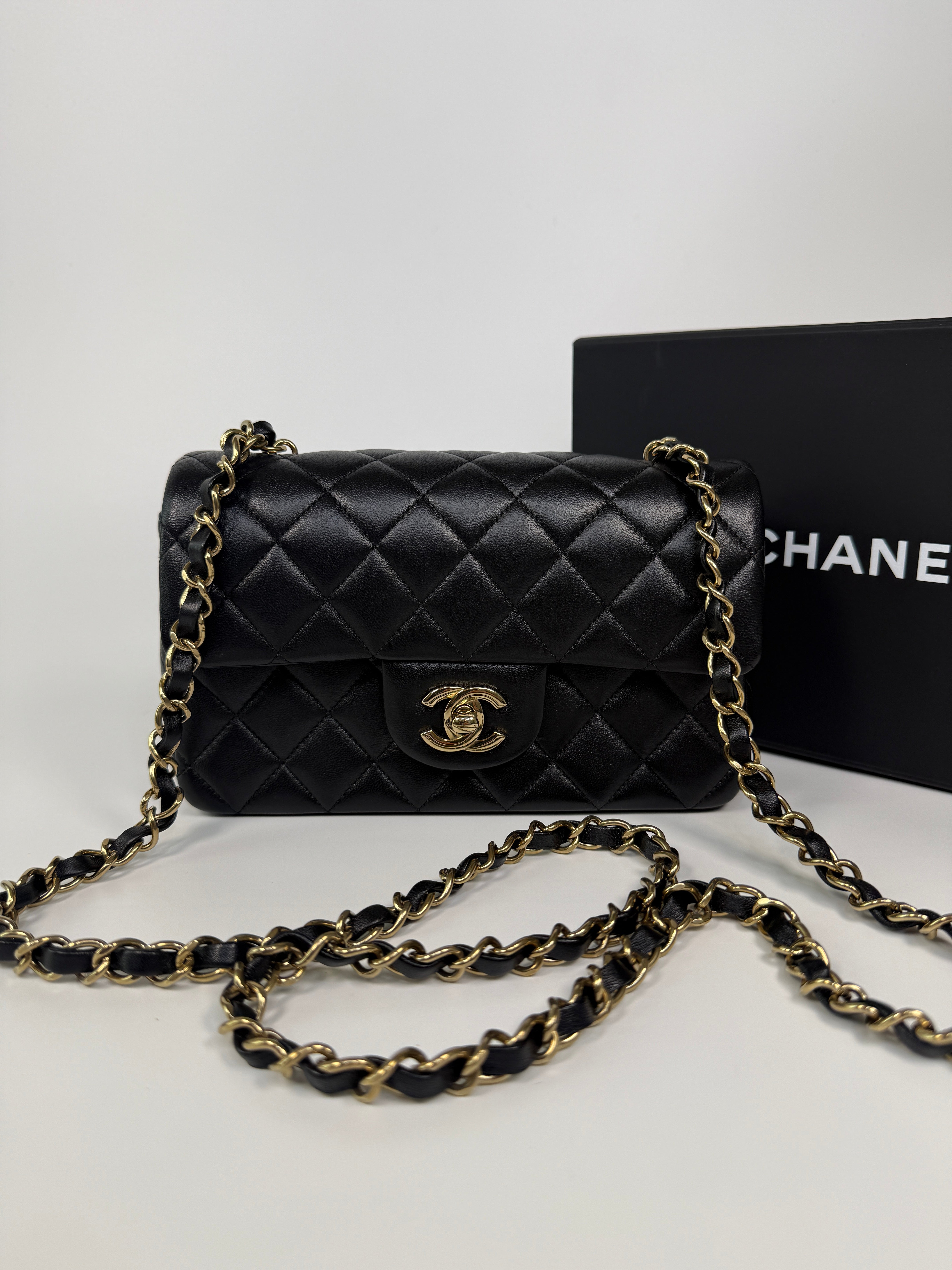 Chanel Mini Rectangle In Black Lambskin Leather With Pale Gold Hardware