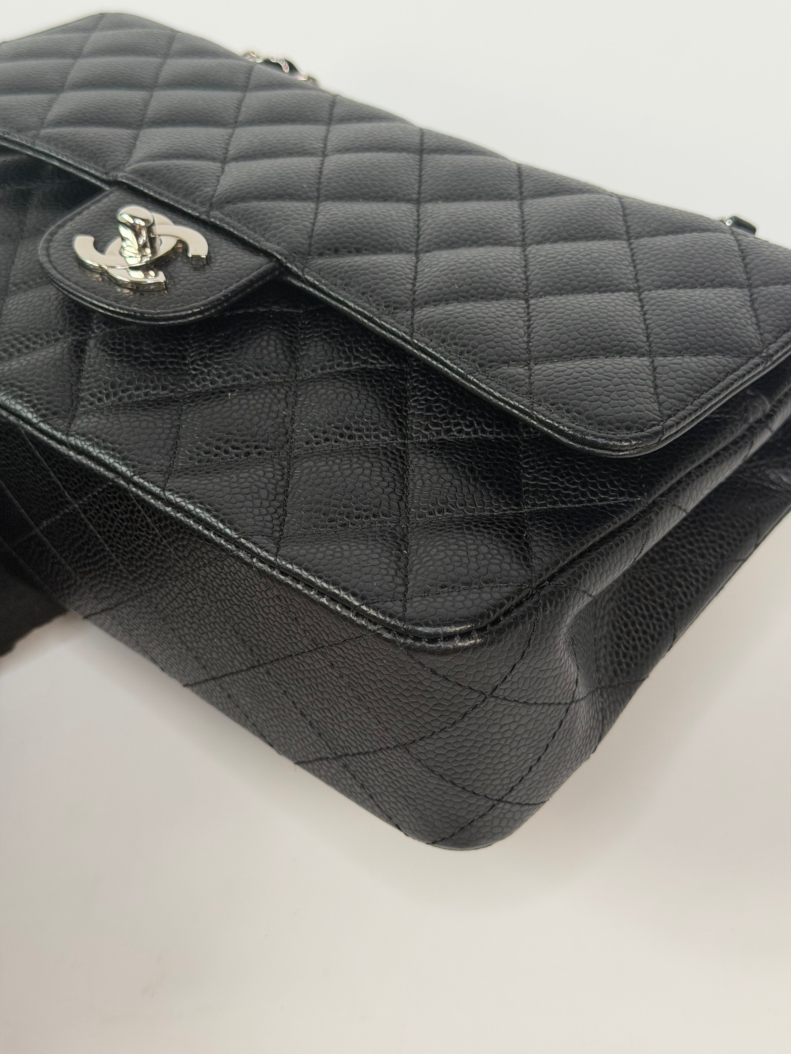Chanel Vintage Medium Classic Double Flap Black Caviar Silver Hardware. 100% authentic and preloved in excellent condition