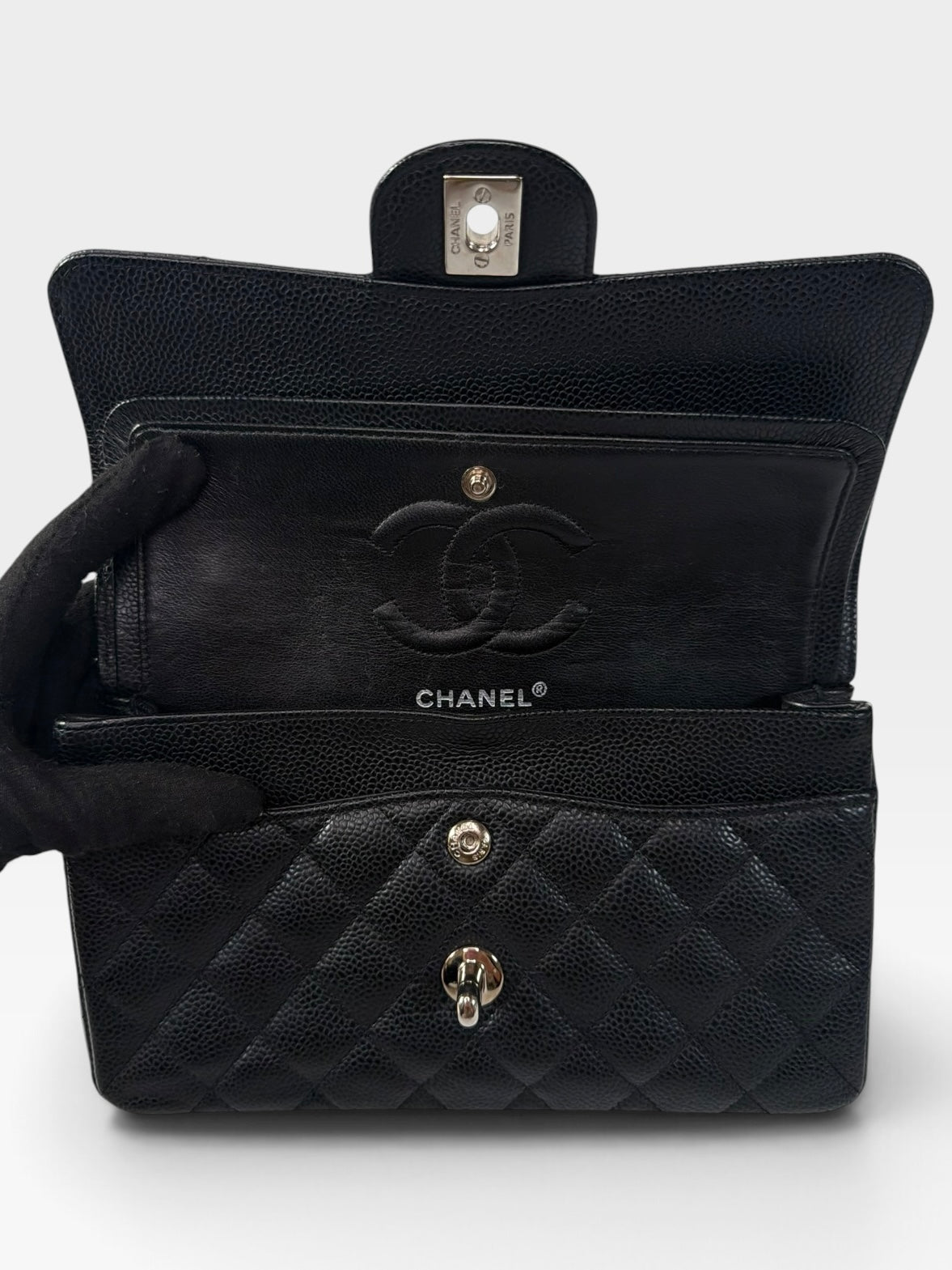 Chanel Vintage Small Classic Double Flap In Black Caviar Leather With Silver Hardware. 100% authentic and preloved in excellent condition