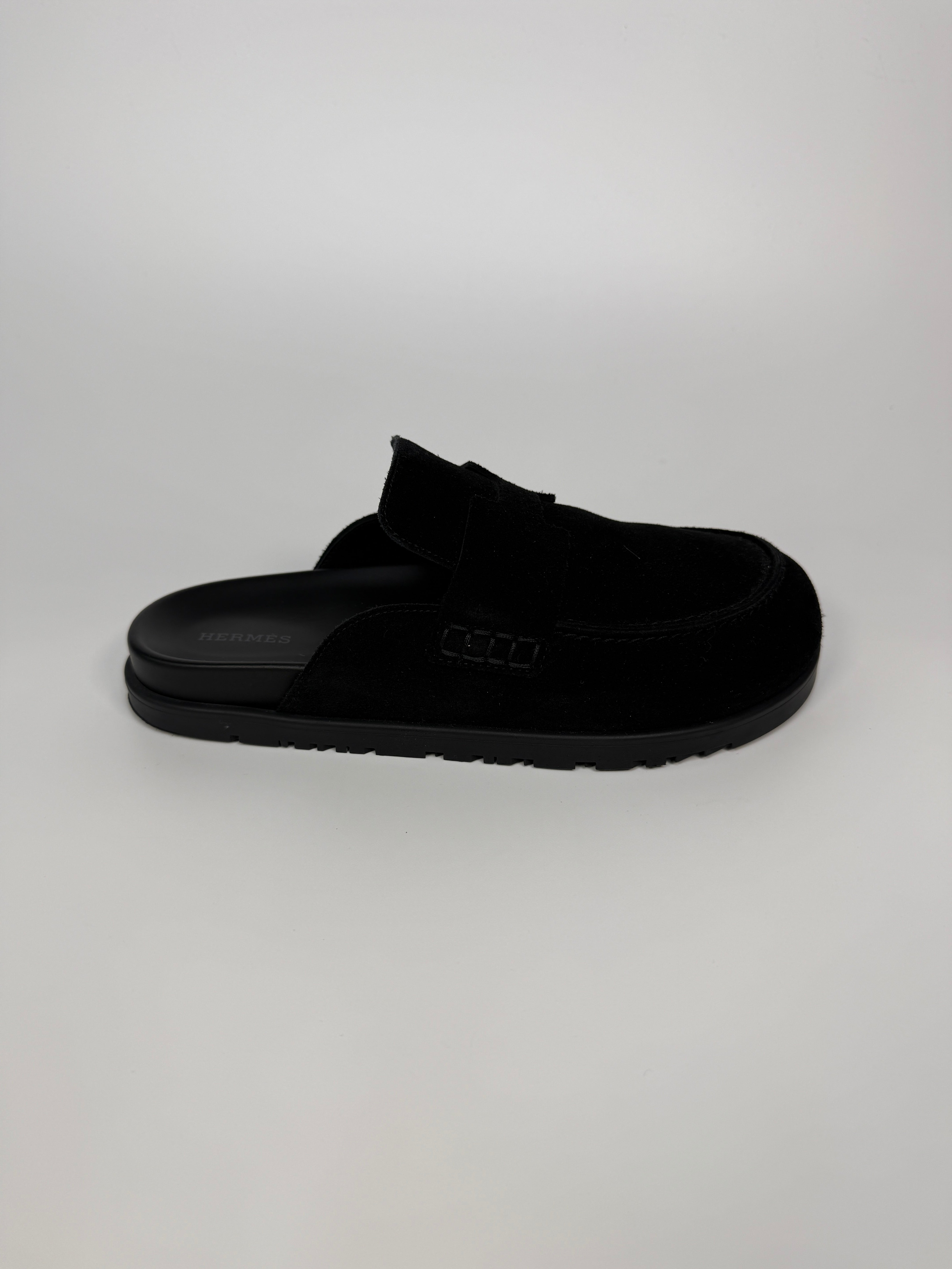 Authentic and preloved Hermès Go Mules In Black  (EU38/ UK5) Excellent condition. Verified by Luxe Cheshire