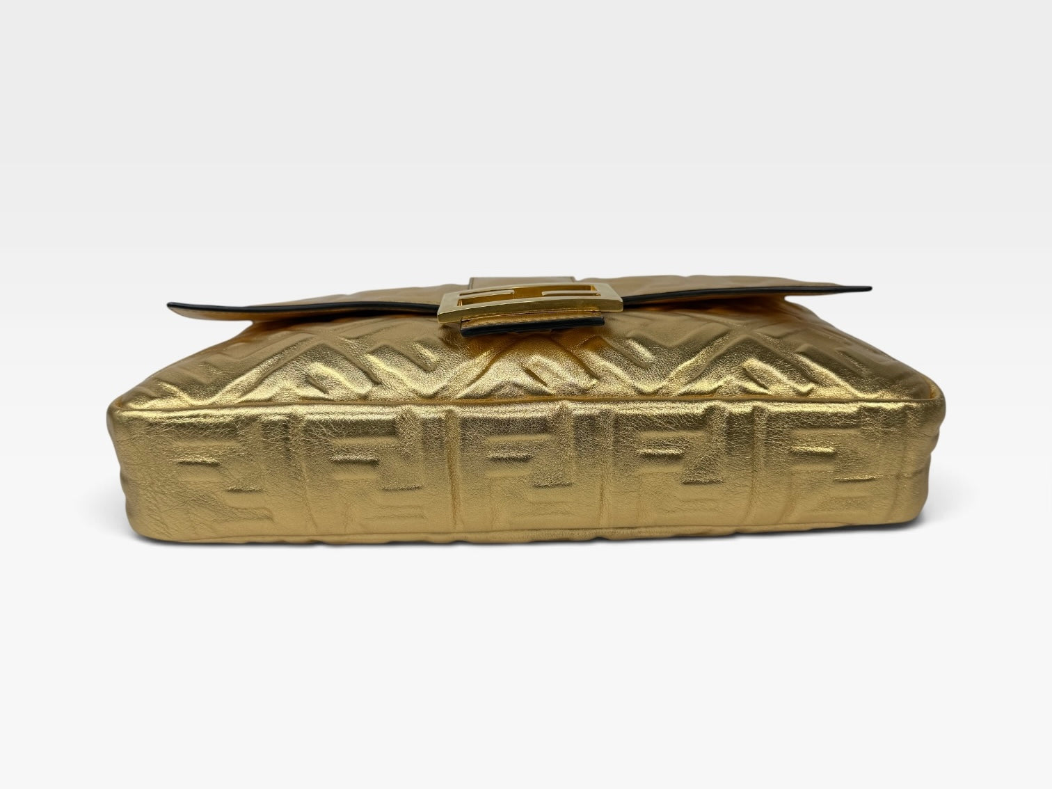 Fendi Large Baguette In Gold Leather Monogram With Gold Hardware. 100% authentic and preloved in excellent condition