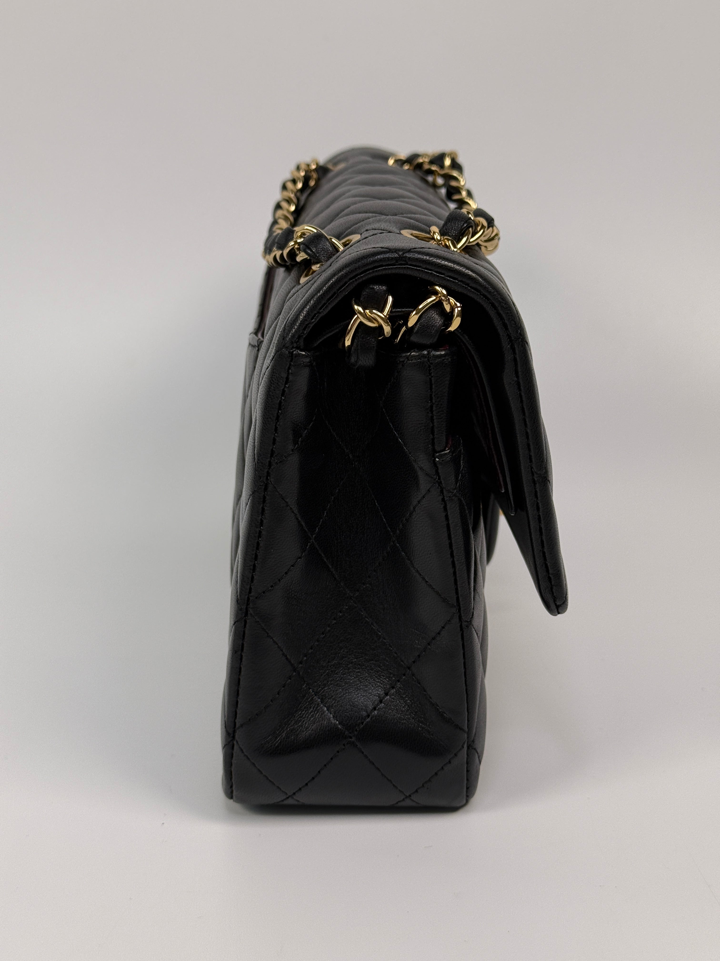 Chanel Medium Classic Double Flap Black Lambskin With Gold Hardware
Authentic Pre Loved Verified by Luxe Cheshire Trusted Designer resale