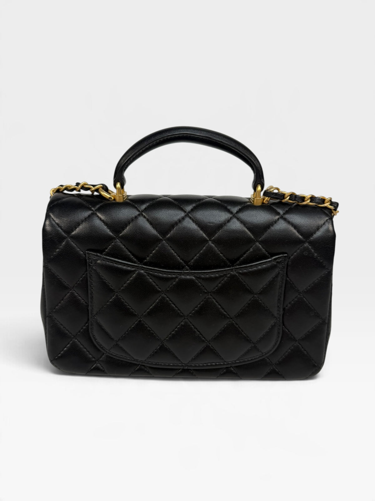 Chanel Mini Rectangle Top Handle In Black Lambskin With Gold Hardware. 100% authentic and pre loved in excellent condition. 