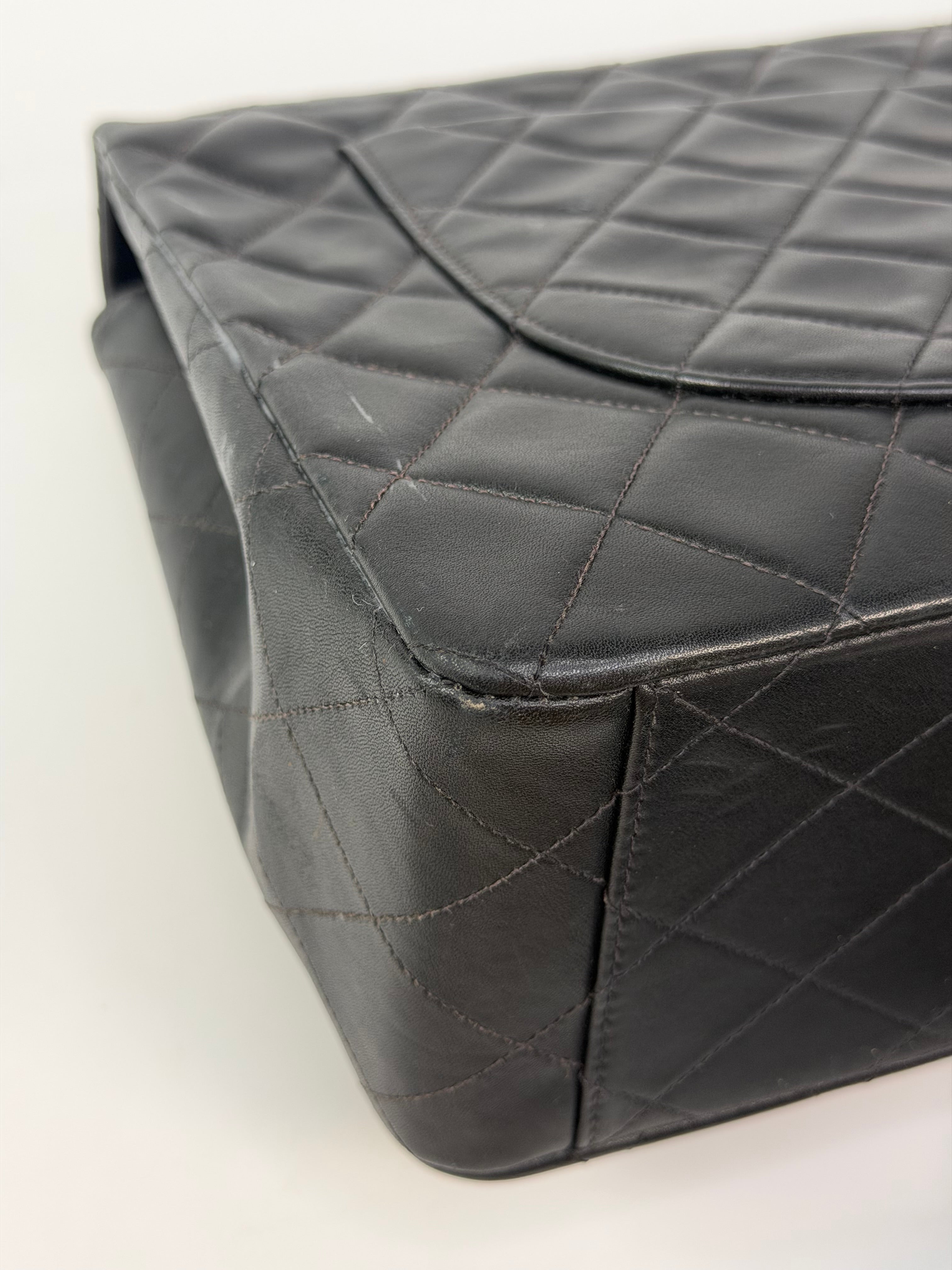 Chanel Vintage XL Maxi Flap Bag In Black Lambskin Gold Hardware. 100% authentic and preloved in excellent condition