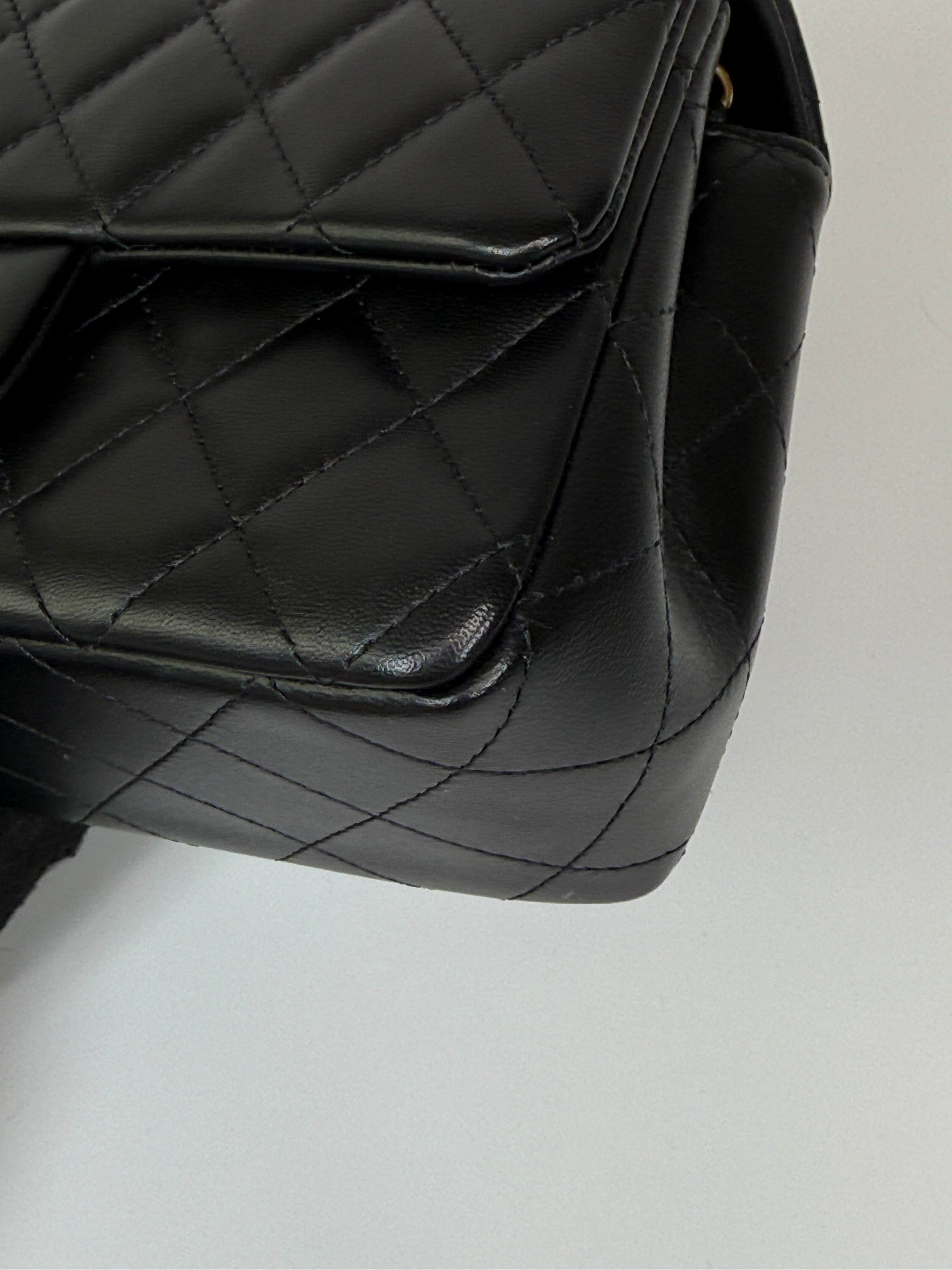 Authentic and preloved Chanel Mini Rectangle Flap Bag In Black Lambskin Leather With Pale Gold Hardware. Excellent condition. 100% Authenticity guarantee 