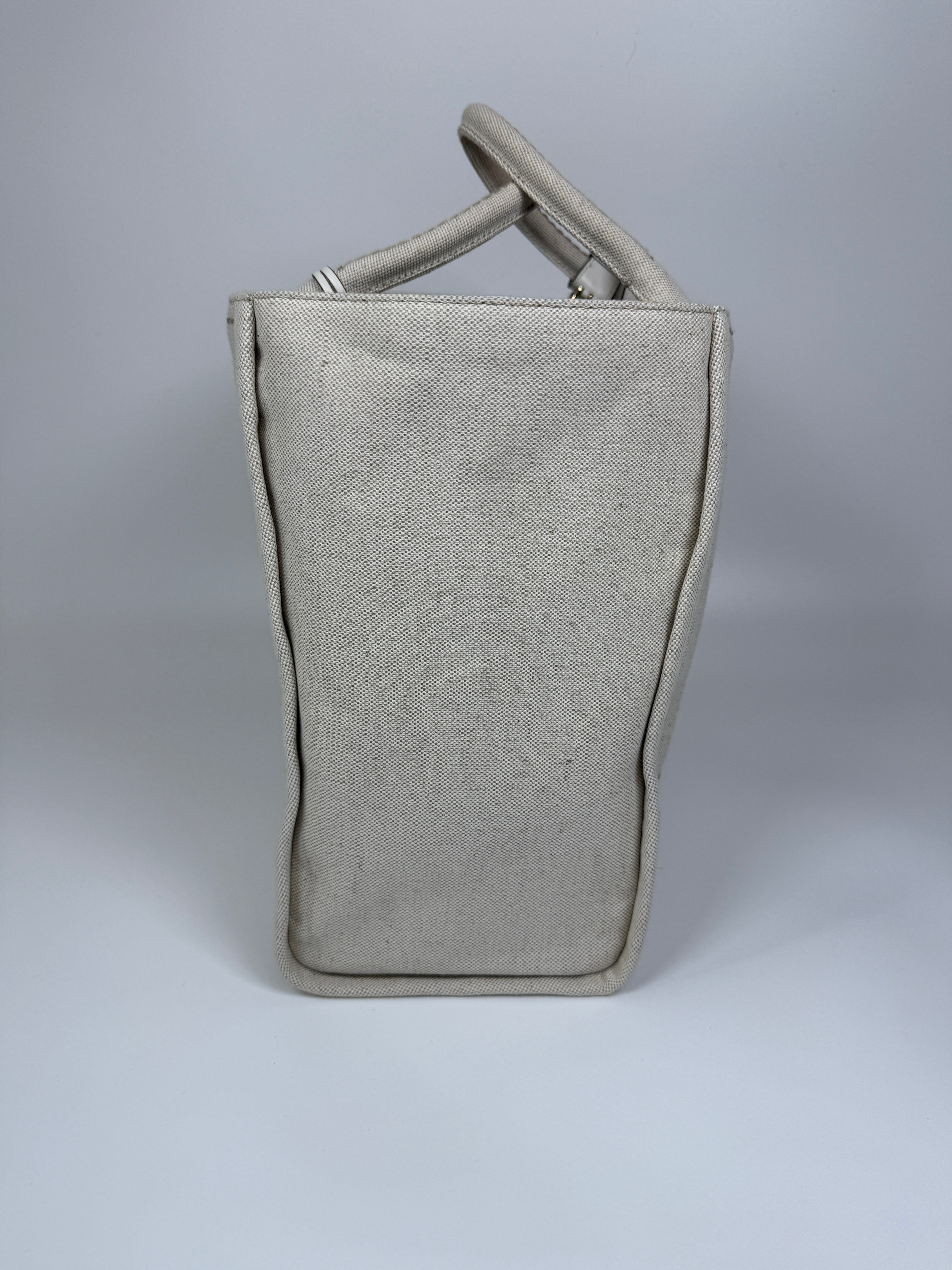 Authentic and preloved Prada Large Appliqué Cotton Tote In Sand Beige Canvas. Excellent Condition. 100% Authenticity guarantee. 