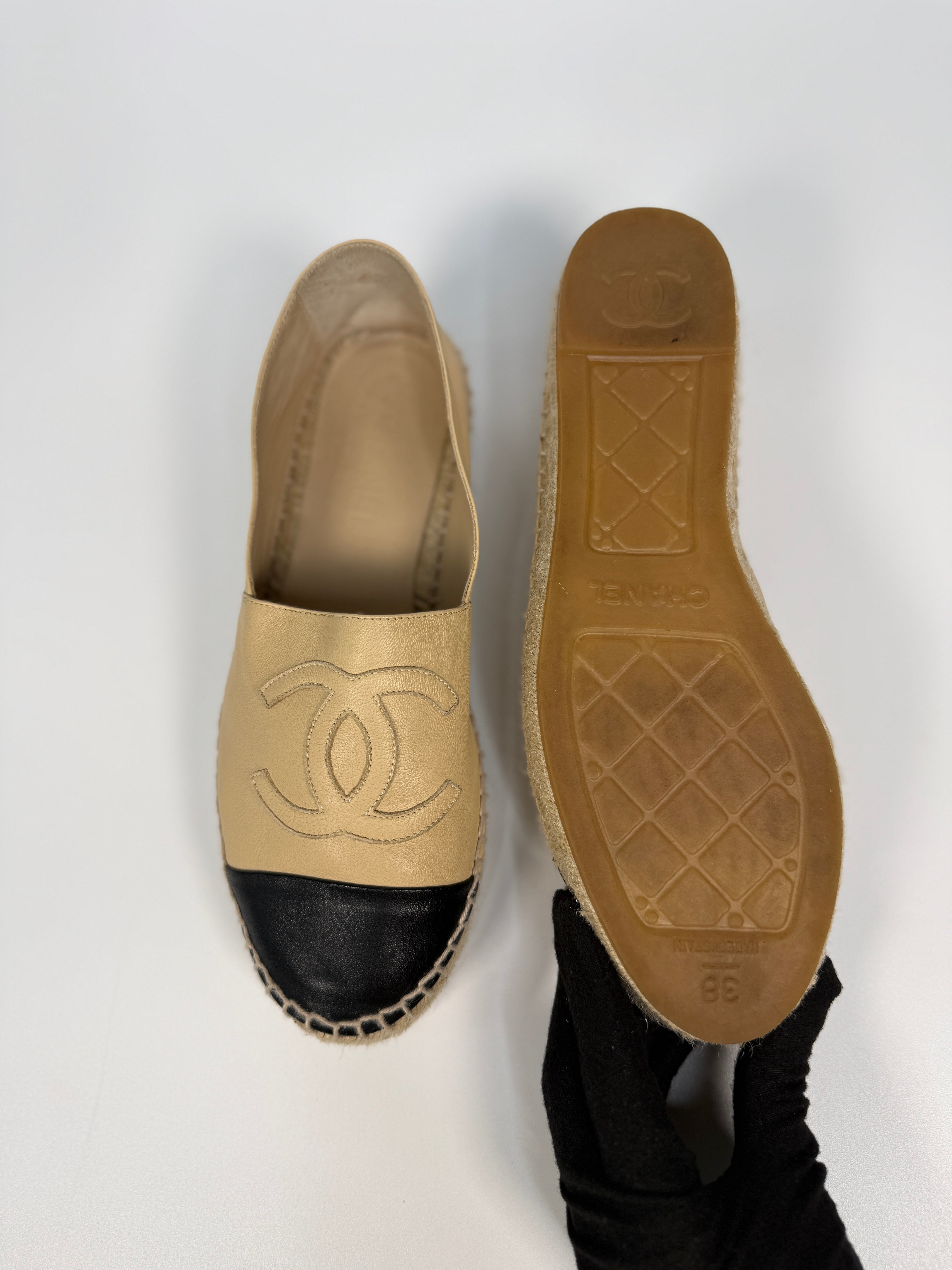 Authentic and preloved Chanel Espadrilles (Size 38/UK5) In Beige and Black Lambskin Leather. Excellent condition. 100% Authenticity guarantee