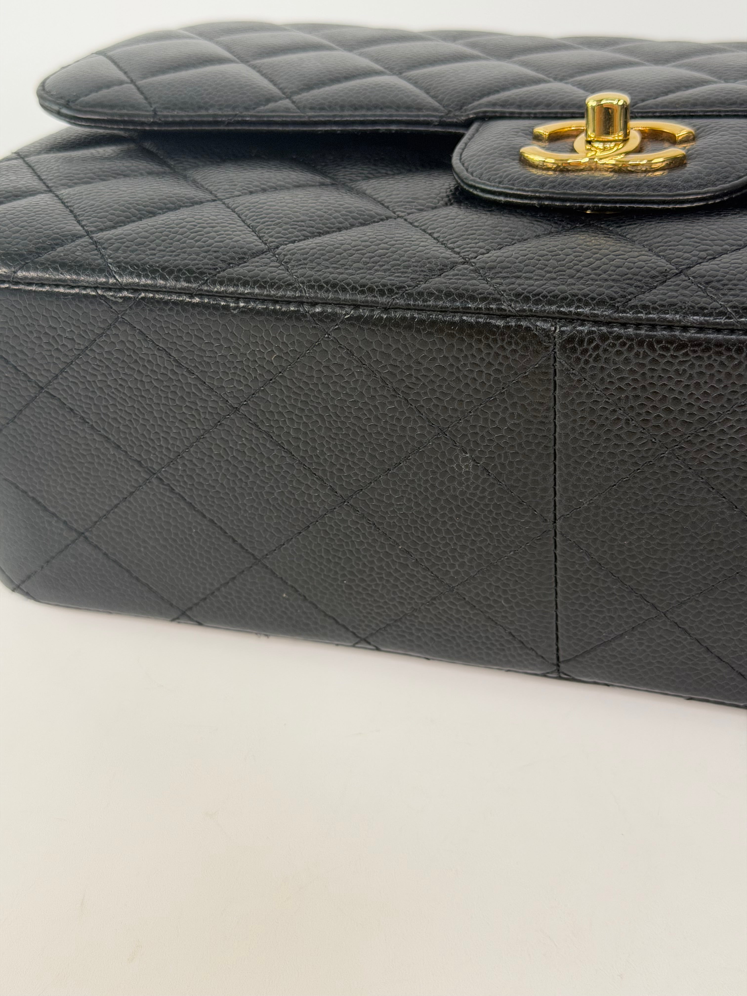 Chanel Jumbo Classic Flap Bag In Black Caviar Leather With Gold Hardware 100% authentic and preloved in excellent condition