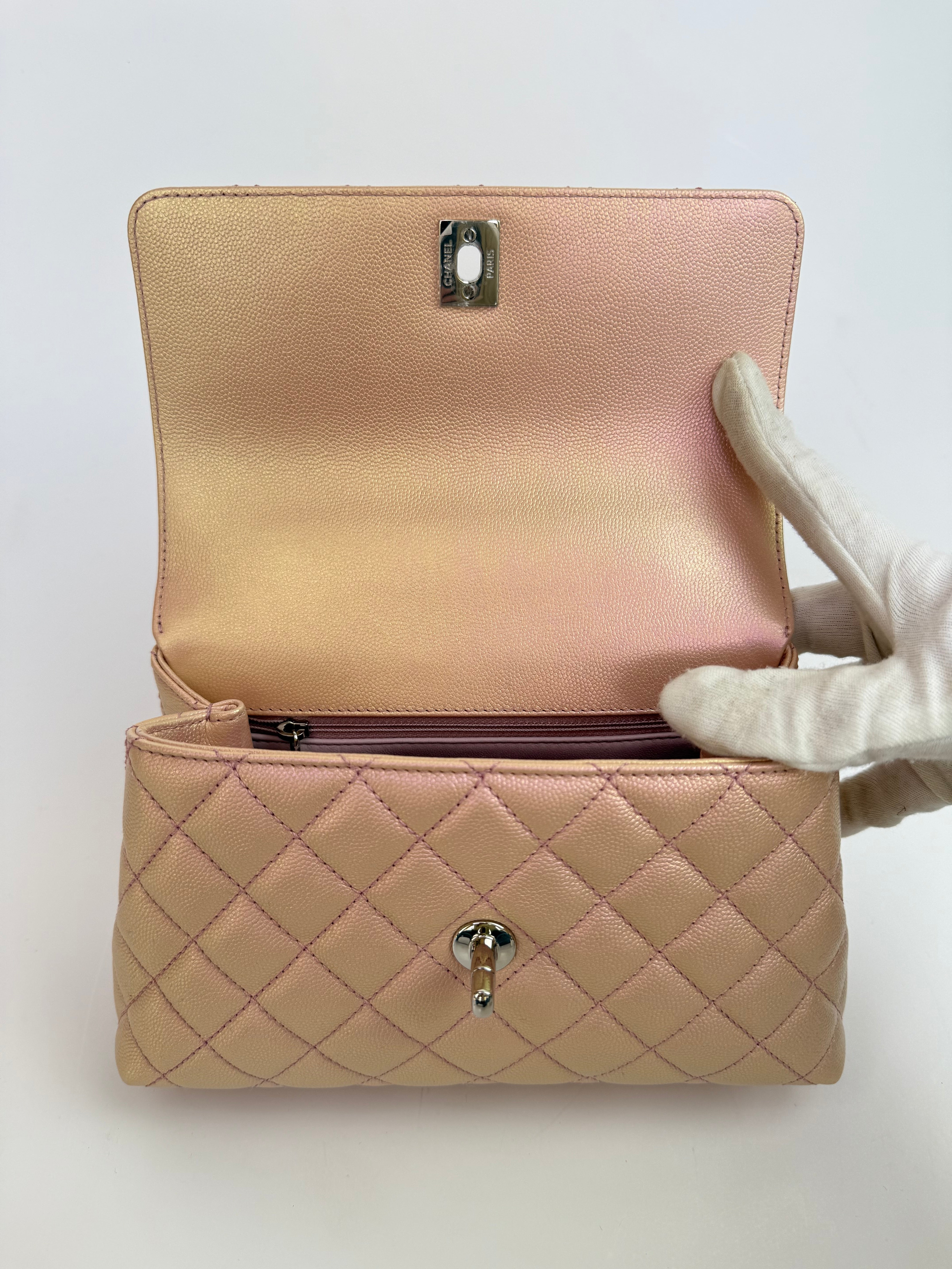 Authentic pre-loved Chanel Small Coco In Iridescent Pink Caviar With Rainbow Hardware. 