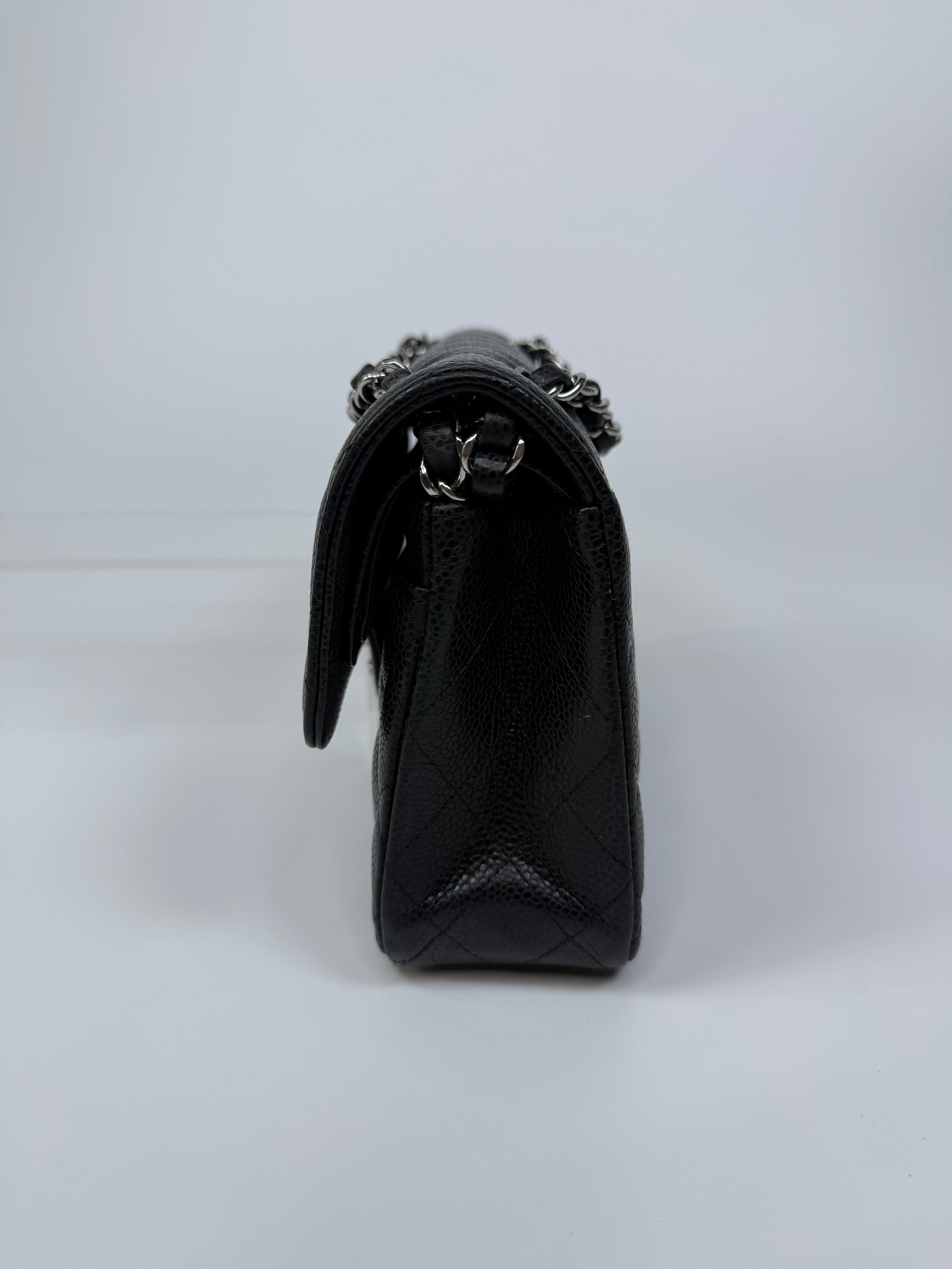 Chanel Small Classic Double Flap In Black Caviar Leather With Silver Hardware. Authentic and preloved in very good condition. 100% Authenticity guarantee 