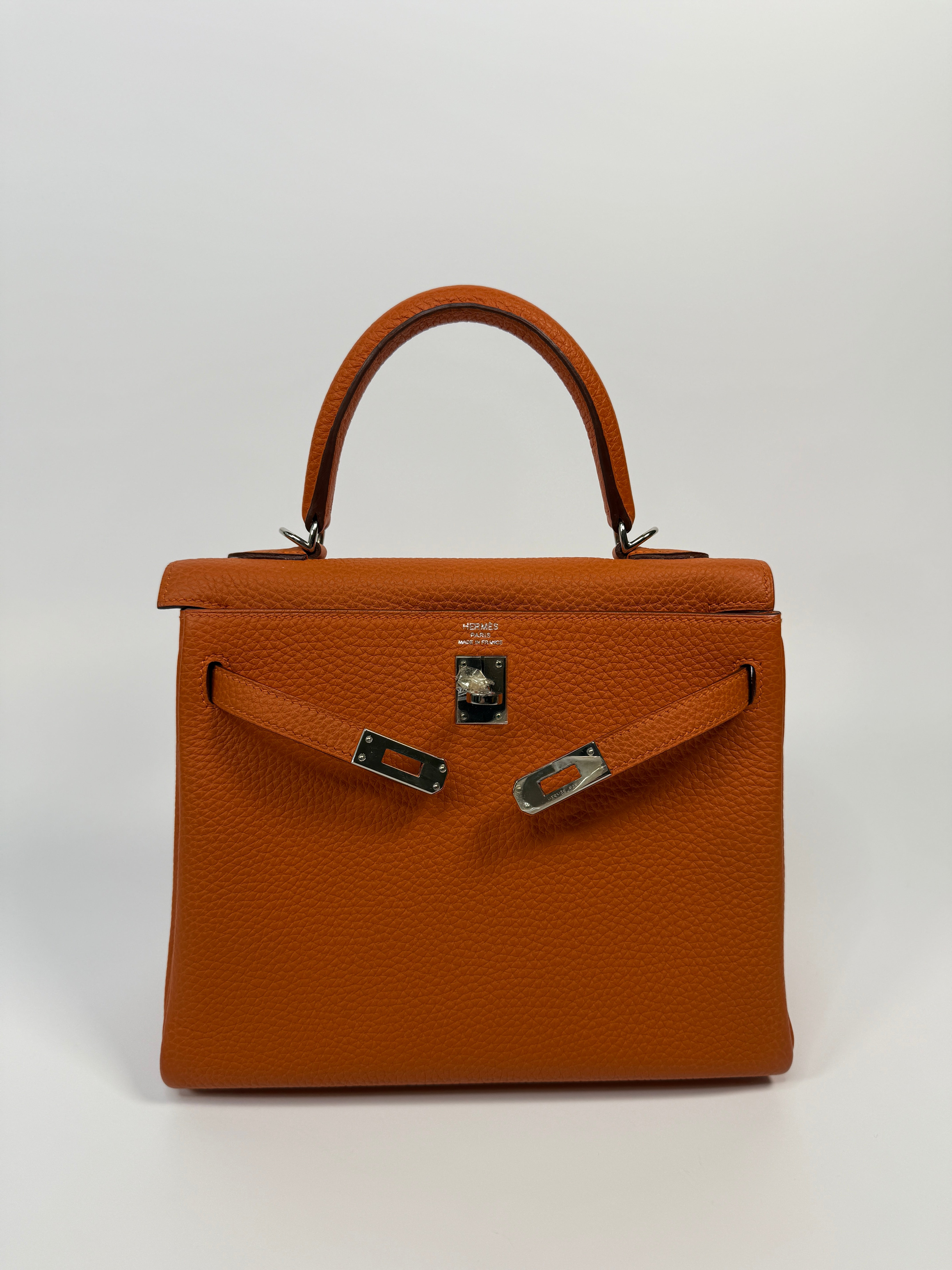 Authentic Pre Loved Hermès Kelly 25 In Orange Togo Leather With Palladium Hardware Excellent Condition