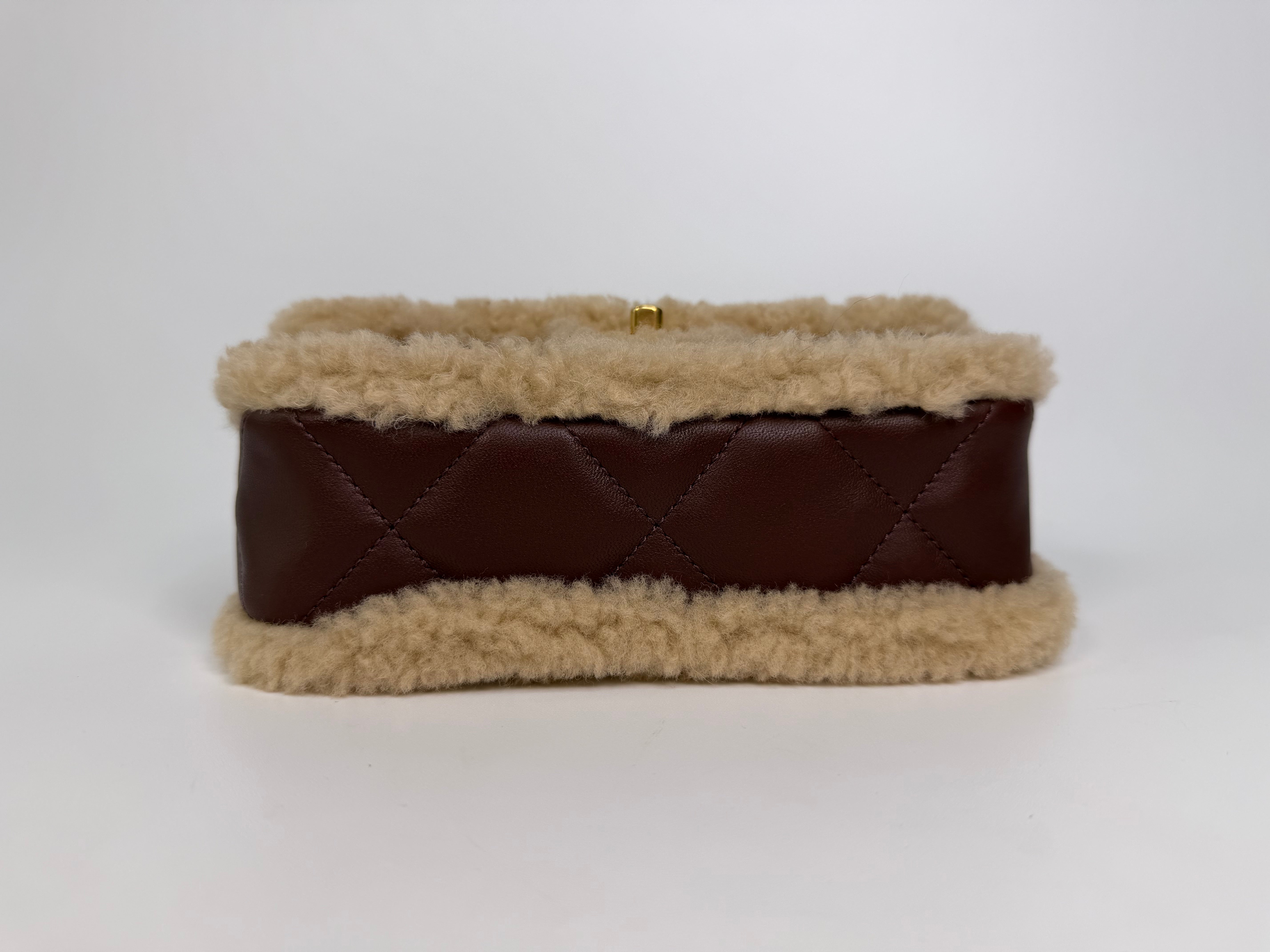 Chanel Mini Rectangle In Brown Lambskin Leather & Shearling With Gold Hardware. Authentic and preloved in excellent condition with 100% authenticity guarantee.