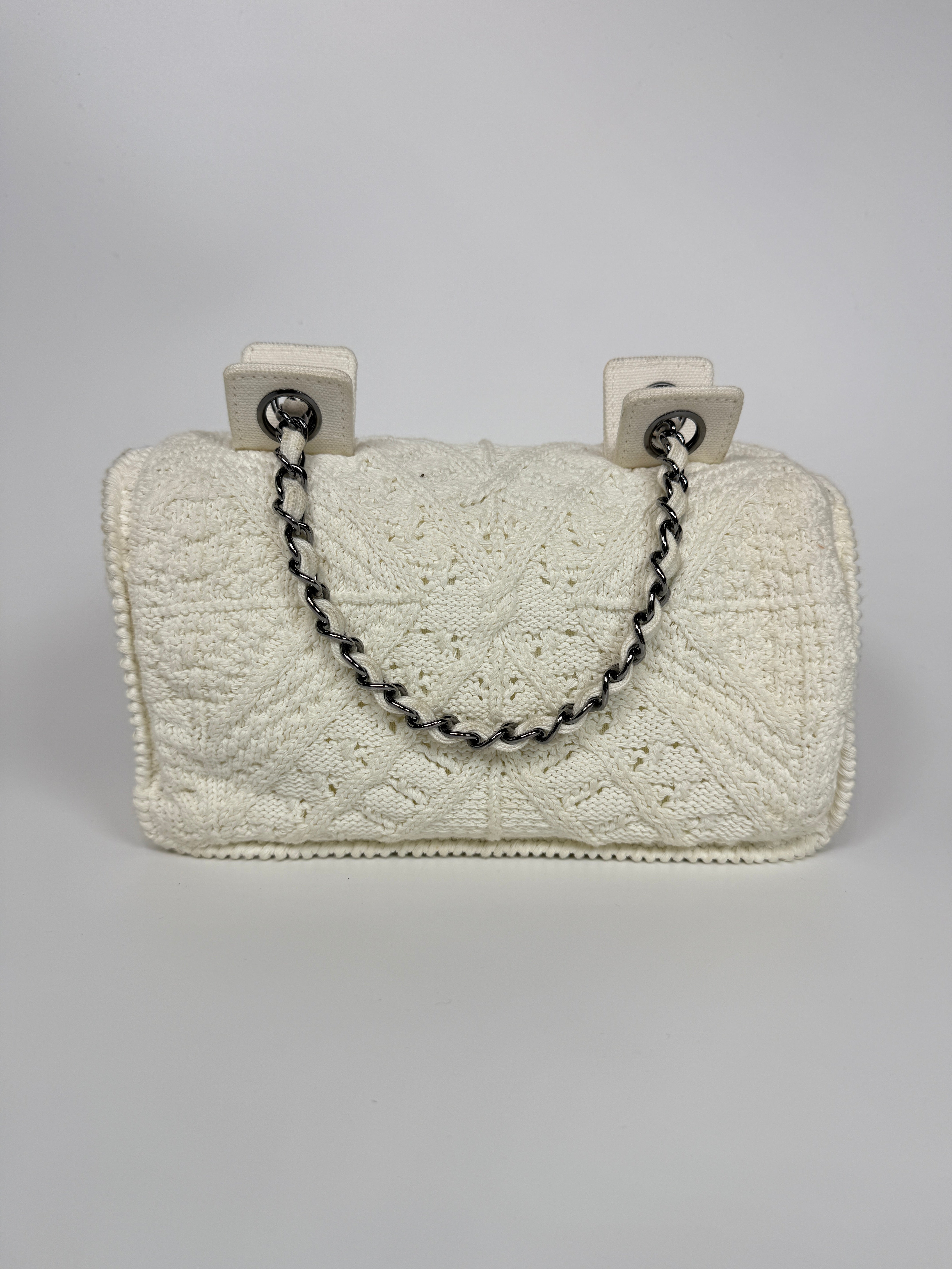 Authentic and preloved Chanel Vintage White Crotchet Flap Bag With Silver hardware. Good condition. 100% Authenticity guarantee 