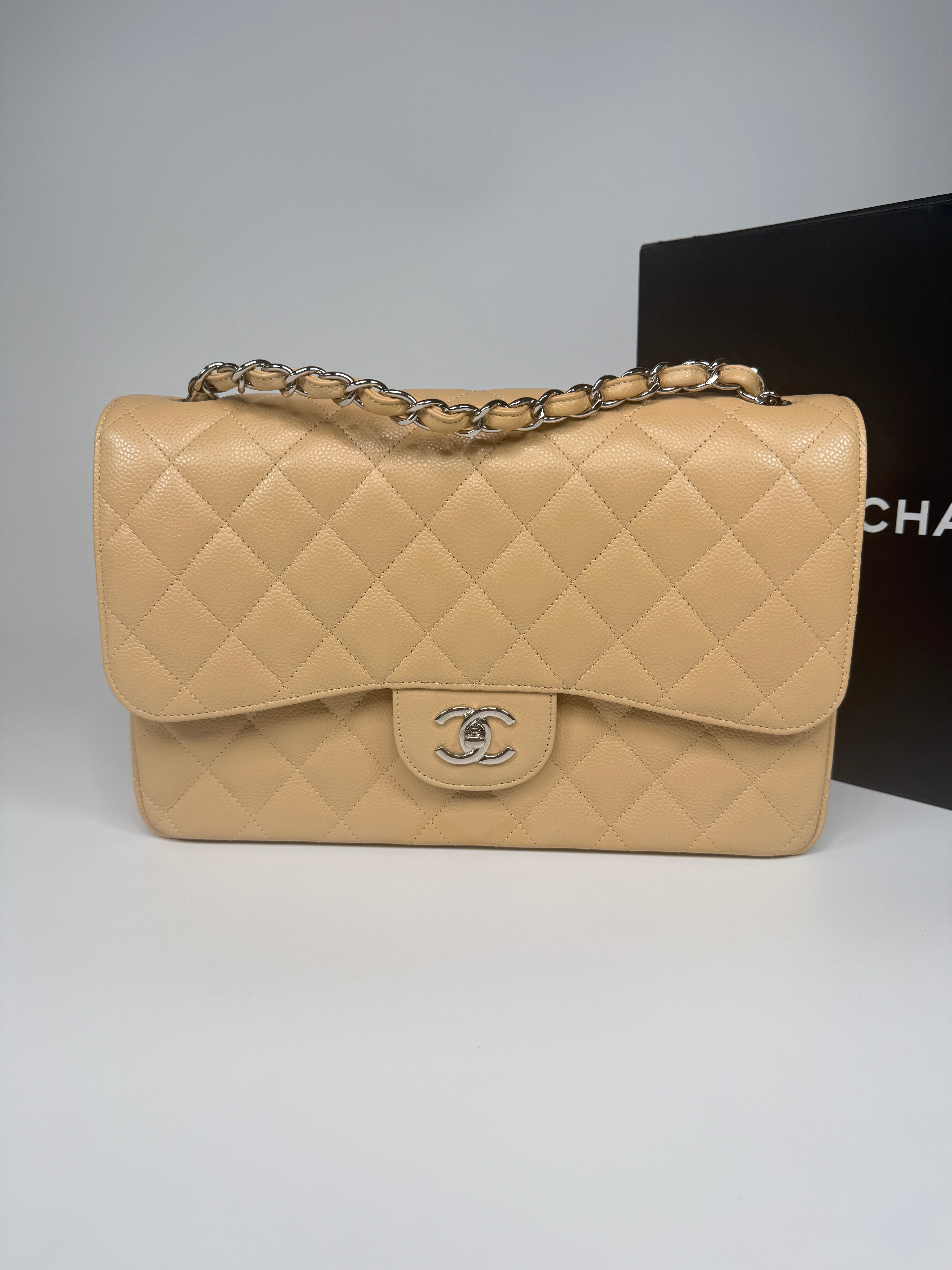 Authentic and preloved Chanel Jumbo Classic Flap Bag In Beige Caviar Leather With Silver Hardware. 100% Authenticity guarantee. Verified by Luxe Cheshire. Fully Insured next day delivery 