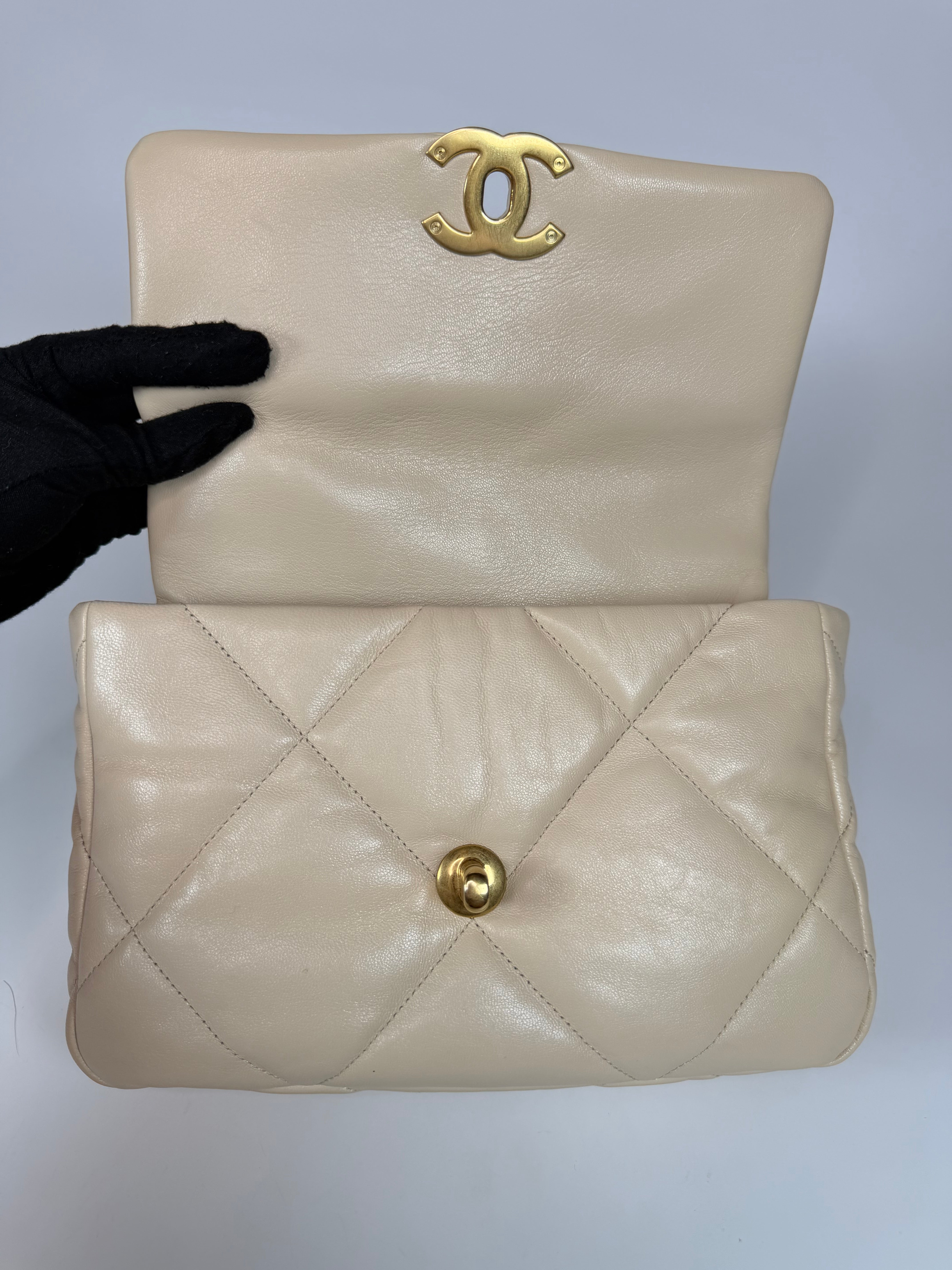 Chanel 19 Small In Beige Leather With Mixed Hardware. Authentic and preloved in excellent condition. Verified by Luxe Cheshire.