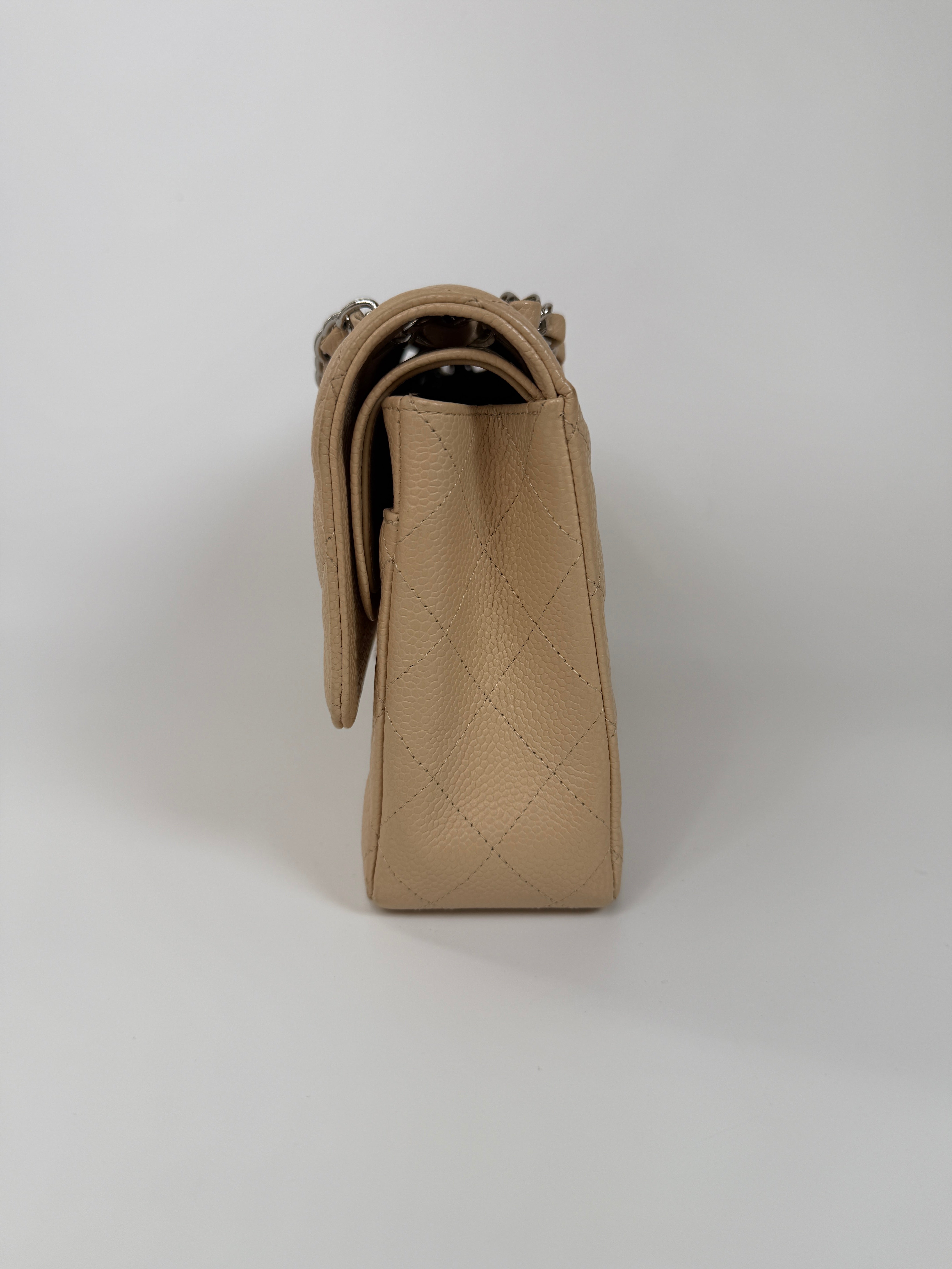 Chanel Medium Classic Double Flap Light Beige Caviar With Silver Hardware
Excellent condition, verified by Luxe Cheshire. International, fast  and fully insured delivery. Trusted designer resale.