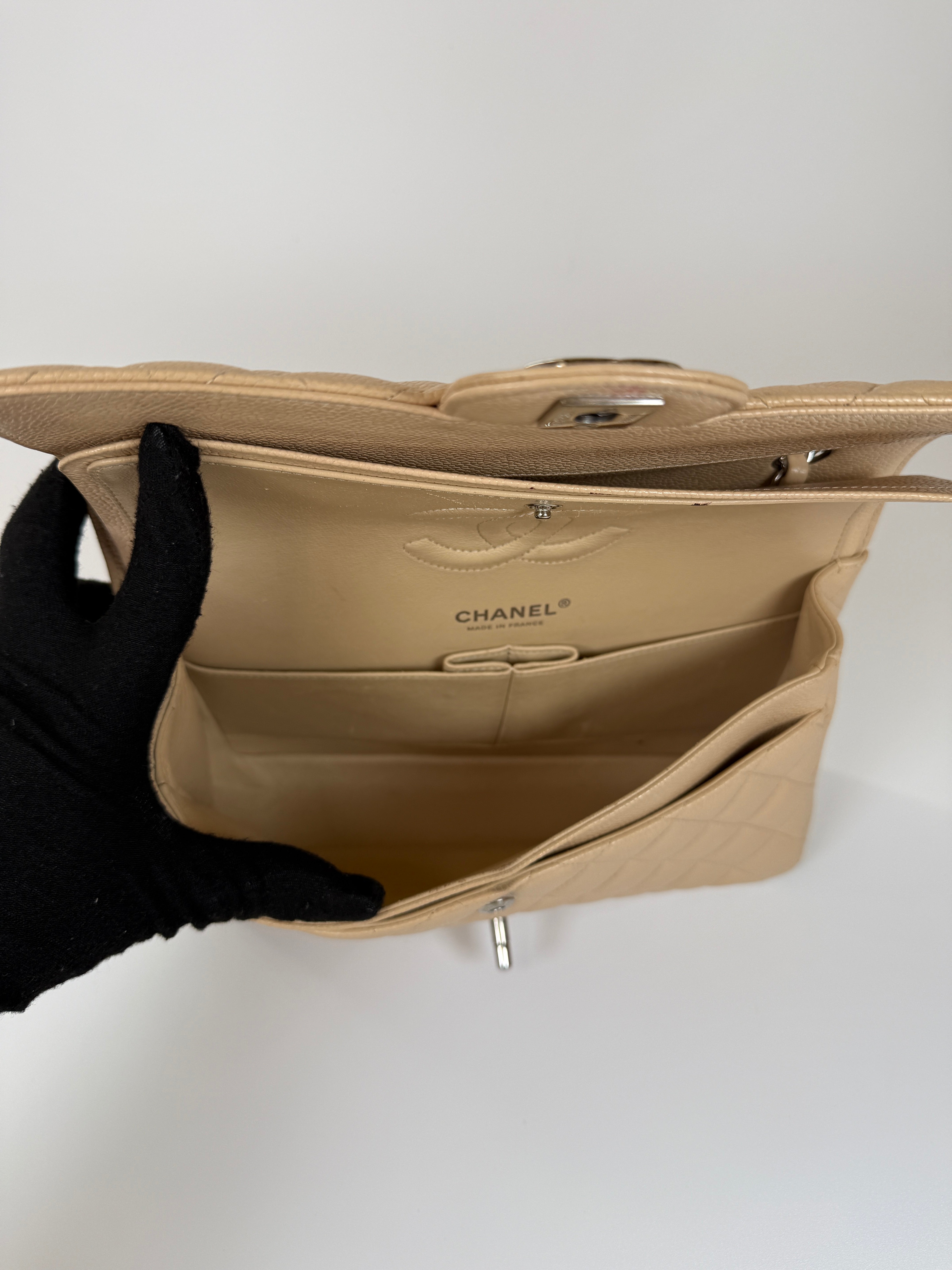 Chanel Medium Classic Double Flap Light Beige Caviar With Silver Hardware
Excellent condition, verified by Luxe Cheshire. International, fast  and fully insured delivery. Trusted designer resale.