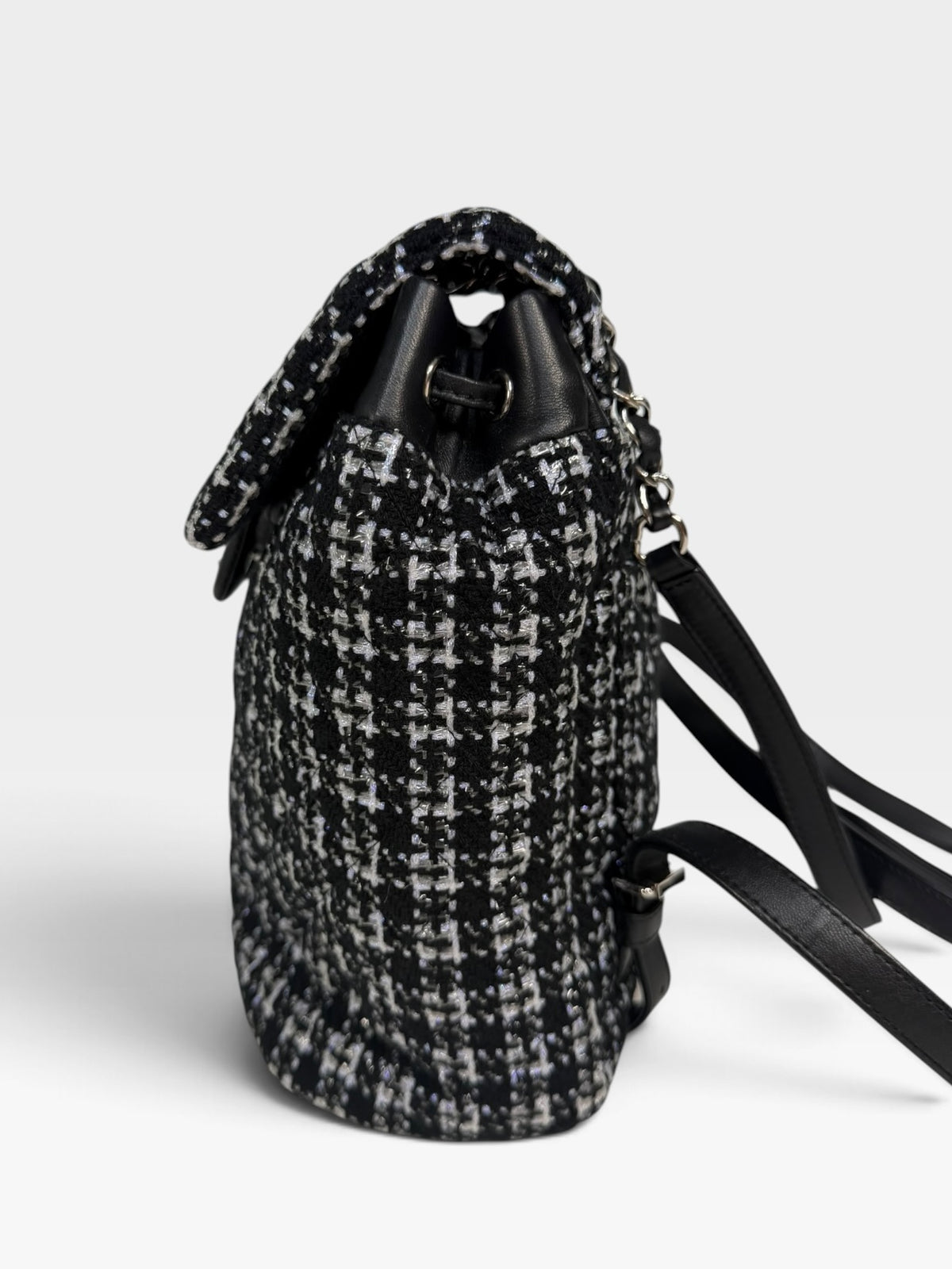 Chanel Backpack In Black & Grey Tweed With Silver Hardware. Authentic and preloved in excellent condition. 100% Guarantee