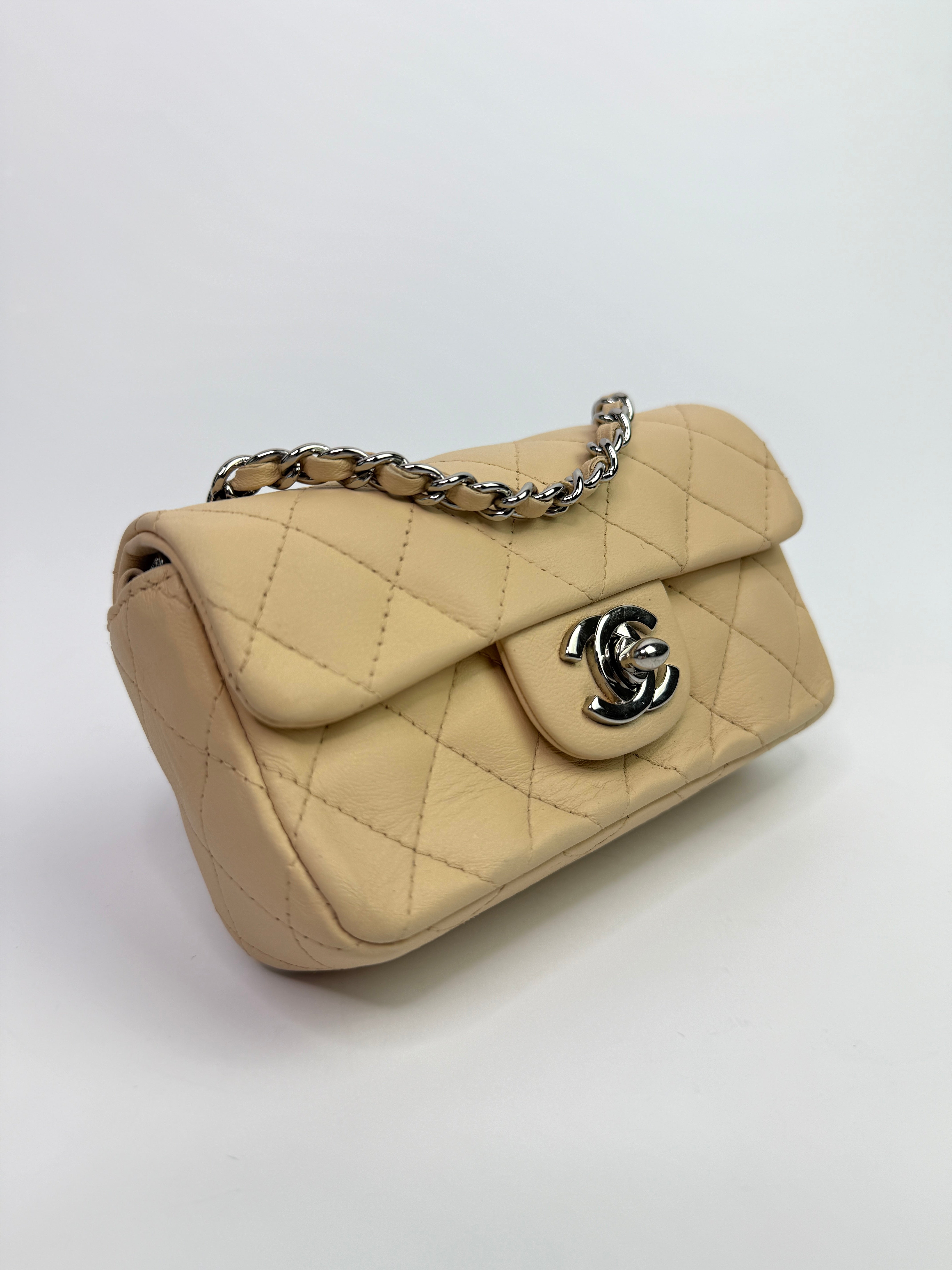 Chanel Super Mini Classic Flap Bag In Beige Lambskin With SHW