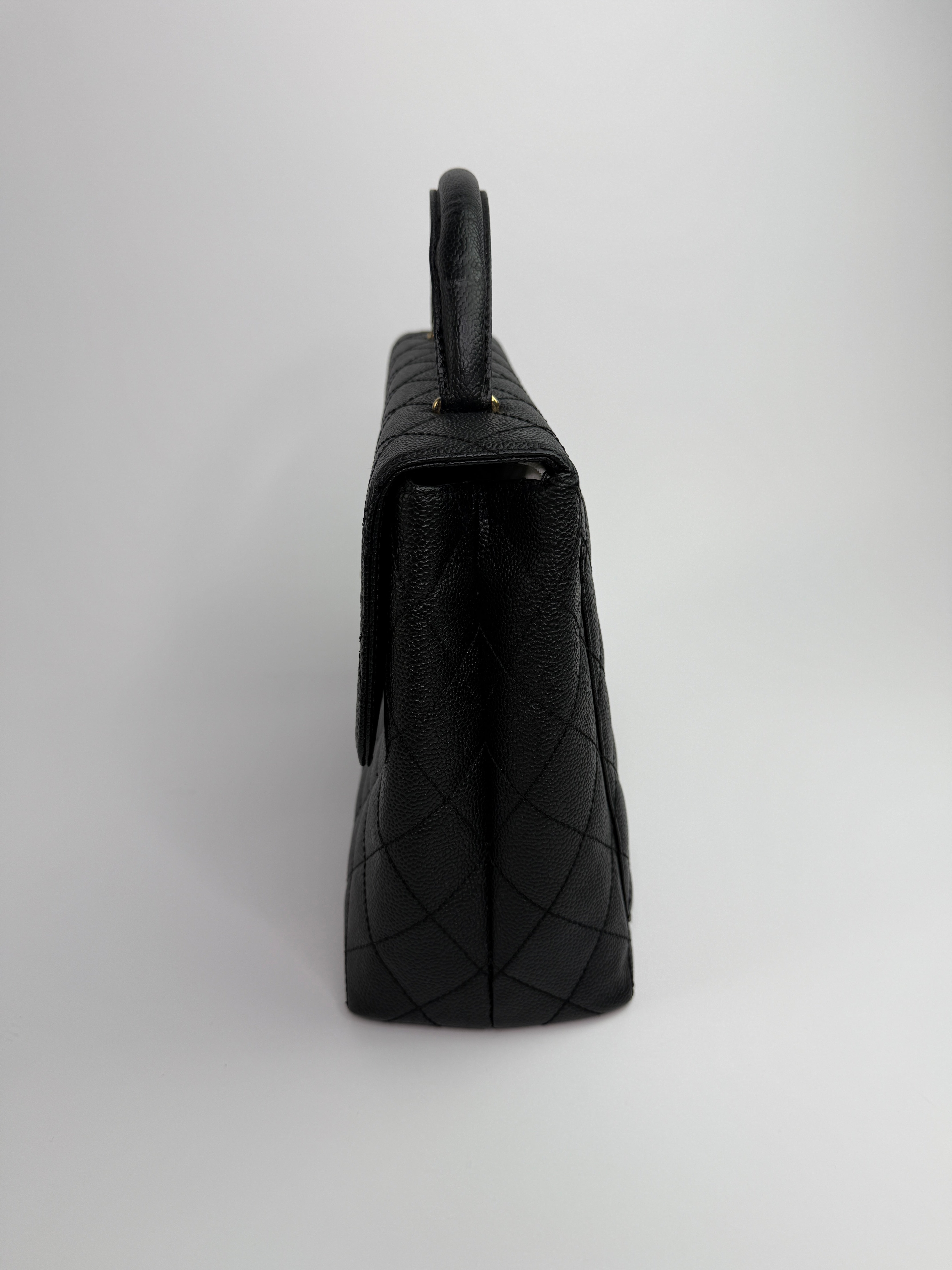 Chanel Vintage Black Caviar Kelly Top Handle
Pre Loved & Authentic 