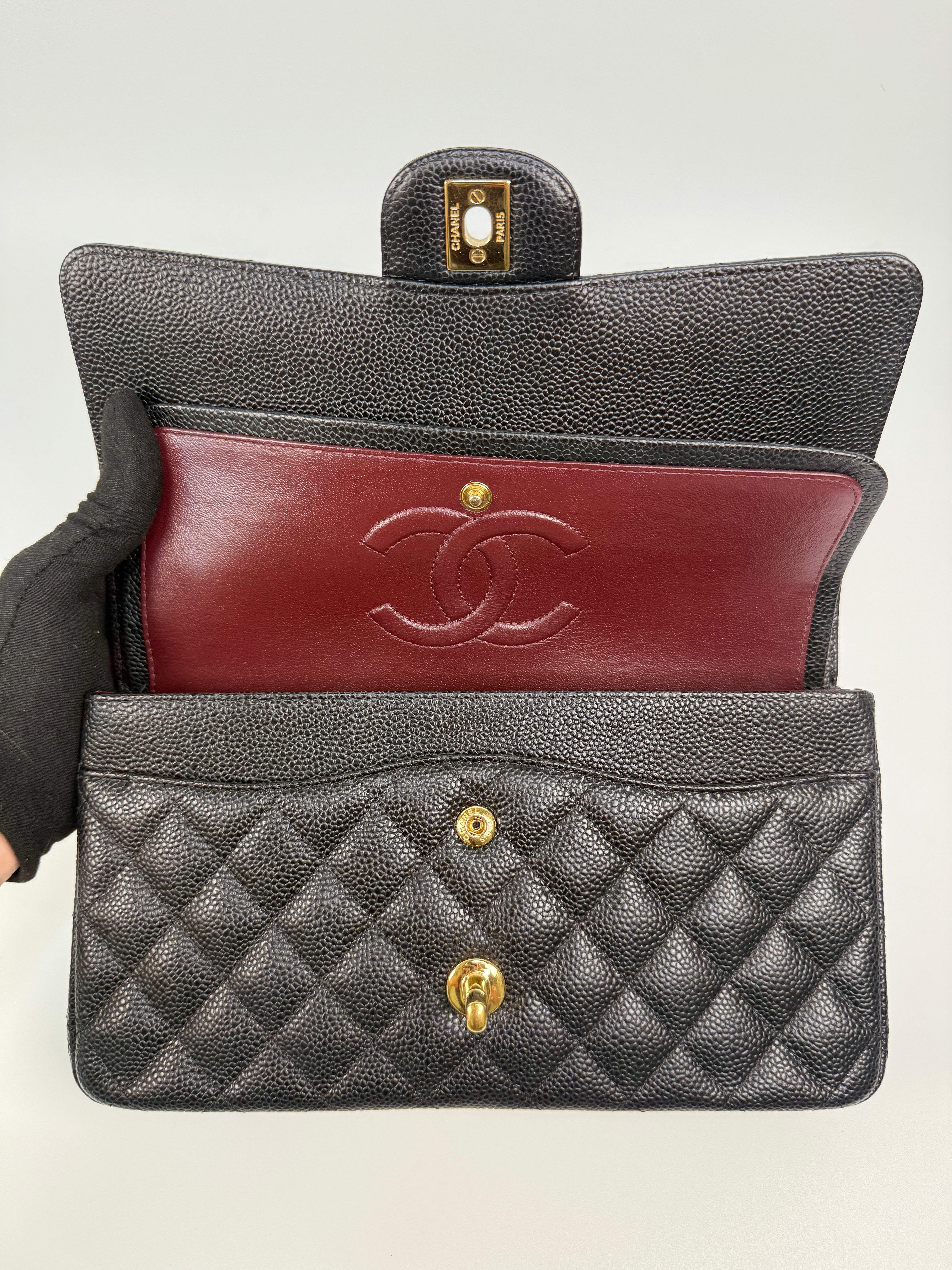 Chanel Medium Classic Double Flap In Black Caviar With Gold Hardware
Authentic Pre Loved Verified by Luxe Cheshire Trusted Designer resale