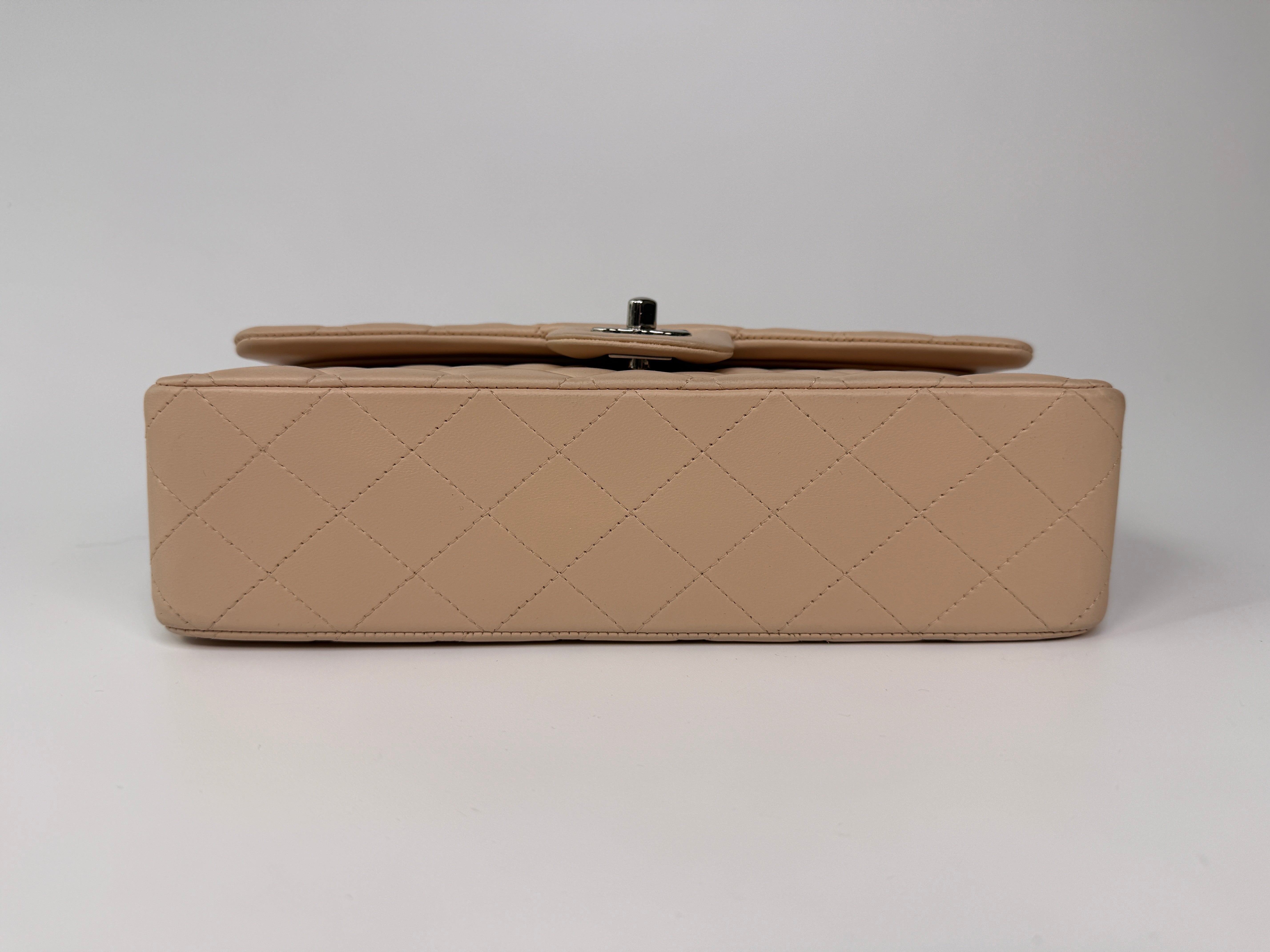 Authentic and preloved Chanel Medium Classic Double Flap Light Beige Lambskin Leather With Silver Hardware