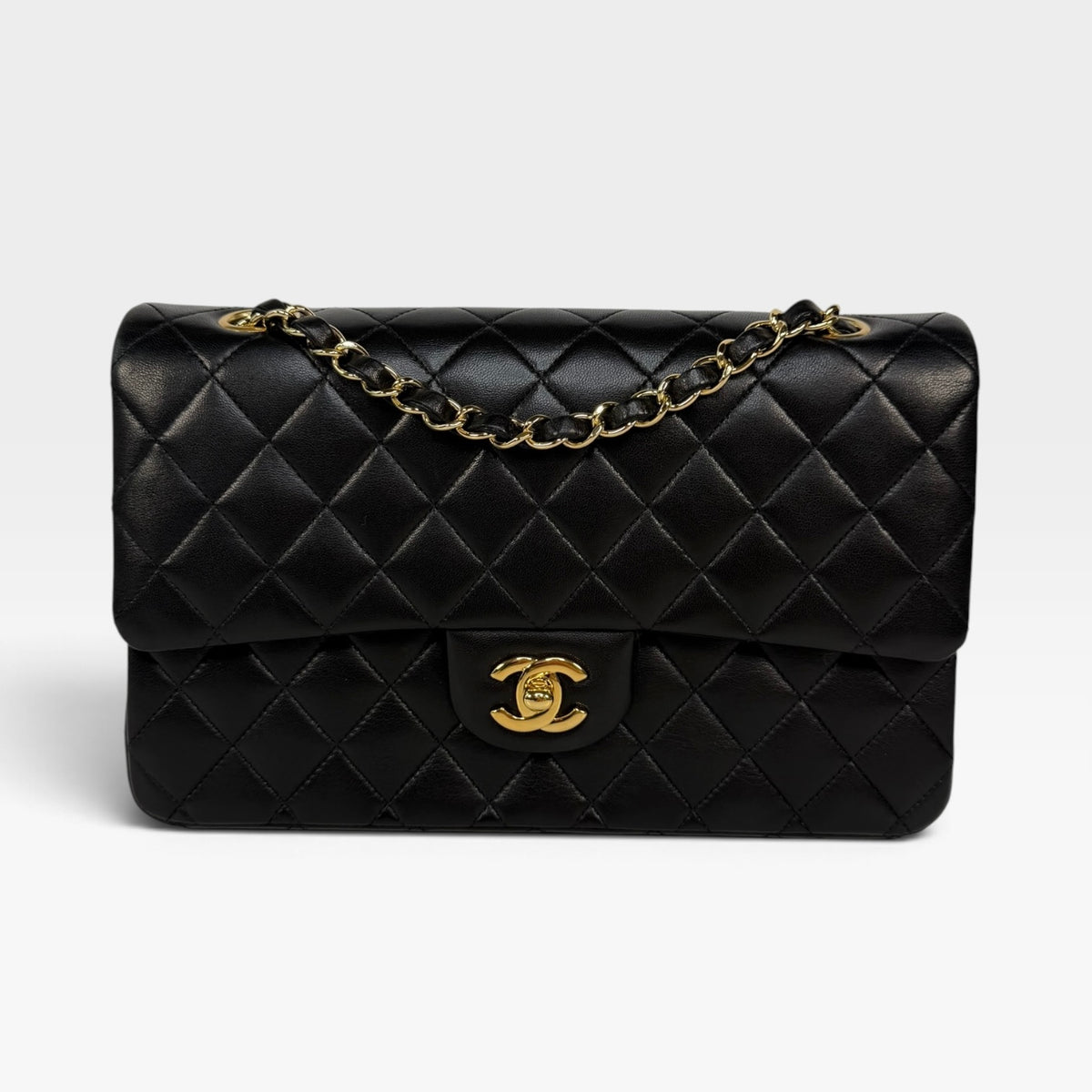 Chanel Medium Classic Double Flap In Black Lambskin Leather With Gold Hardware. 100% authentic and preloved in excellent condition