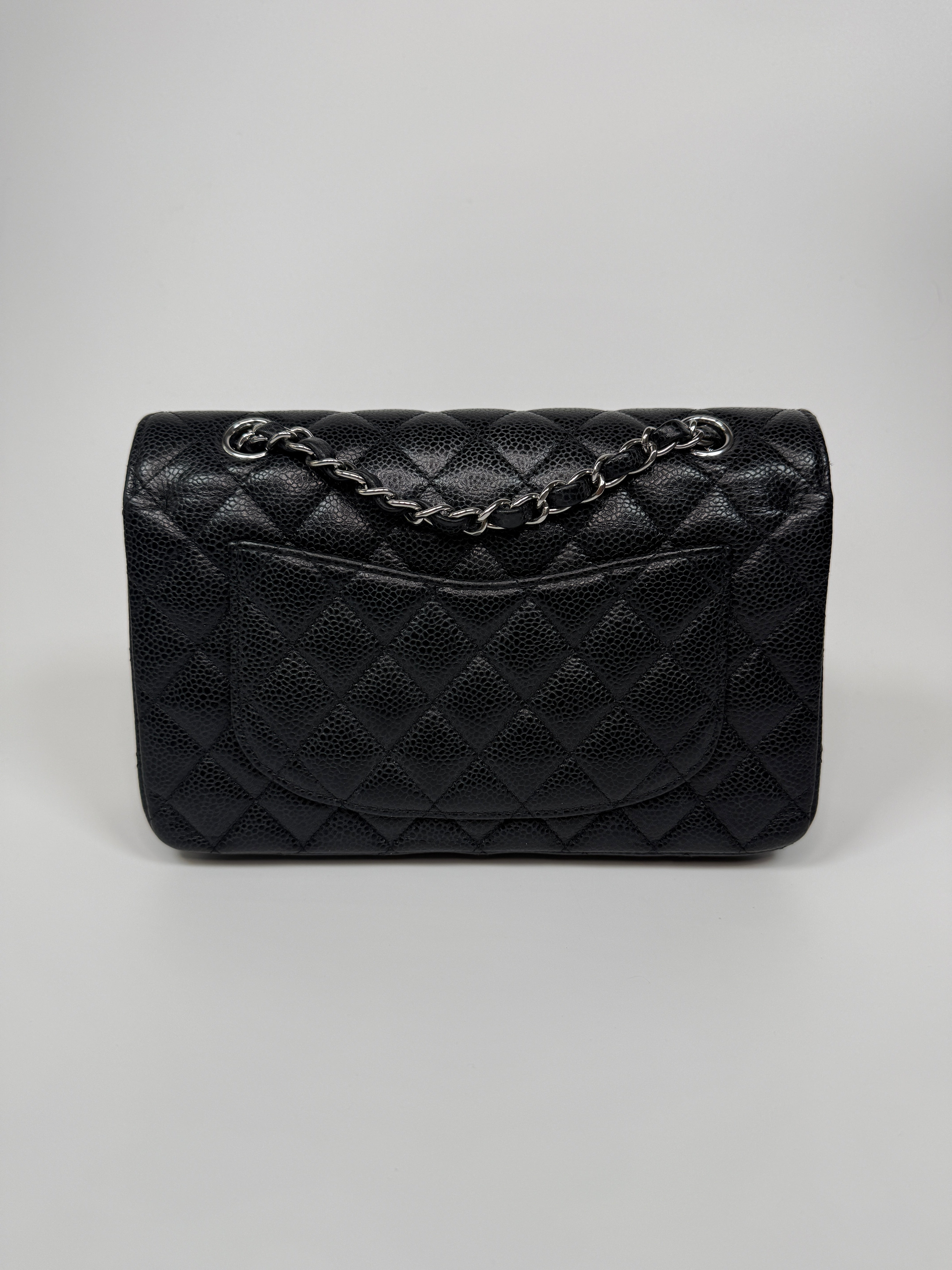 Chanel Small Classic Double Flap In Black Caviar Leather With Silver Hardware. Authentic and preloved in very good condition. 100% Authenticity guarantee 