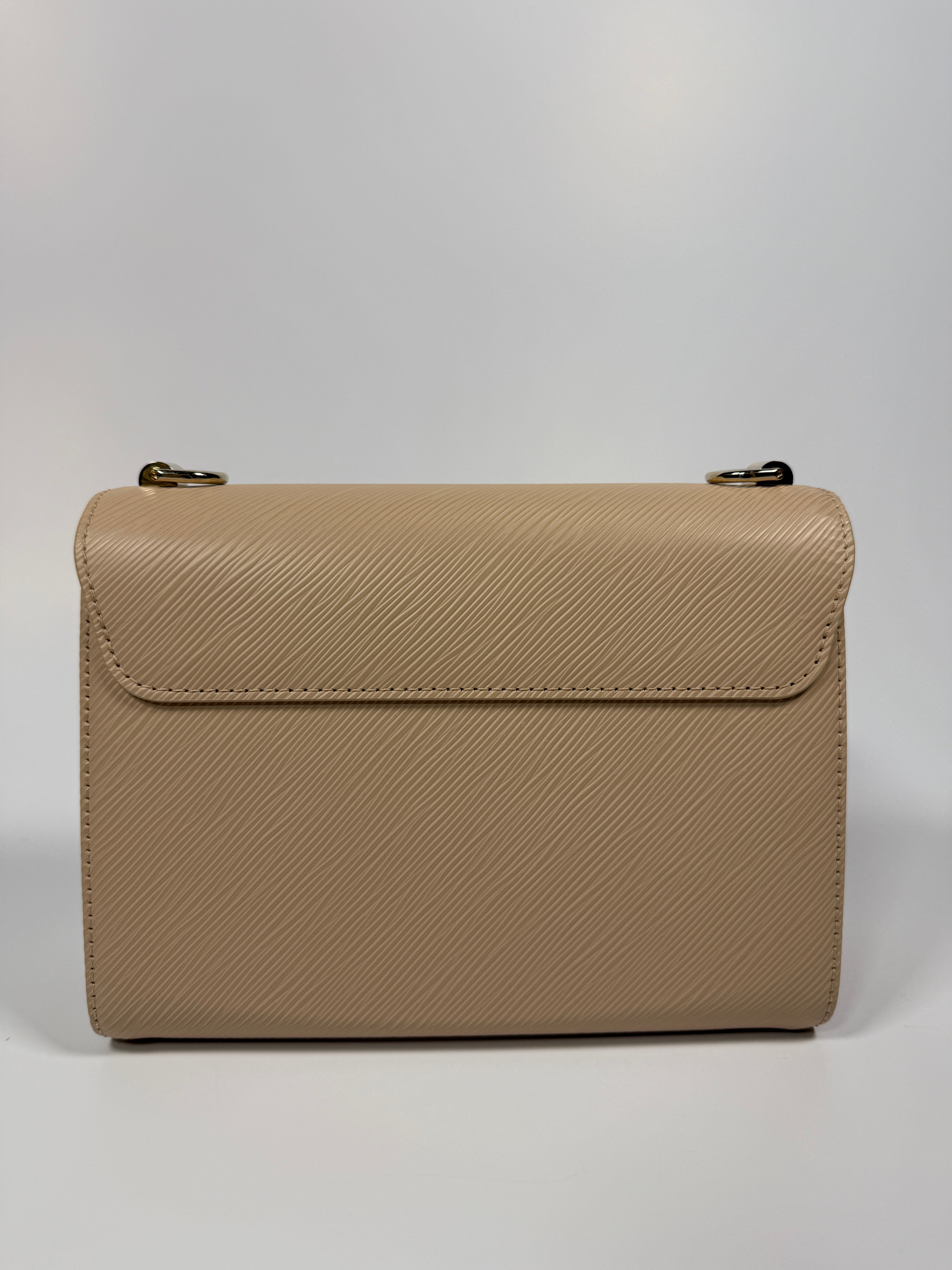 Louis Vuitton Twist MM Bag In Blush Pink Epi Leather 