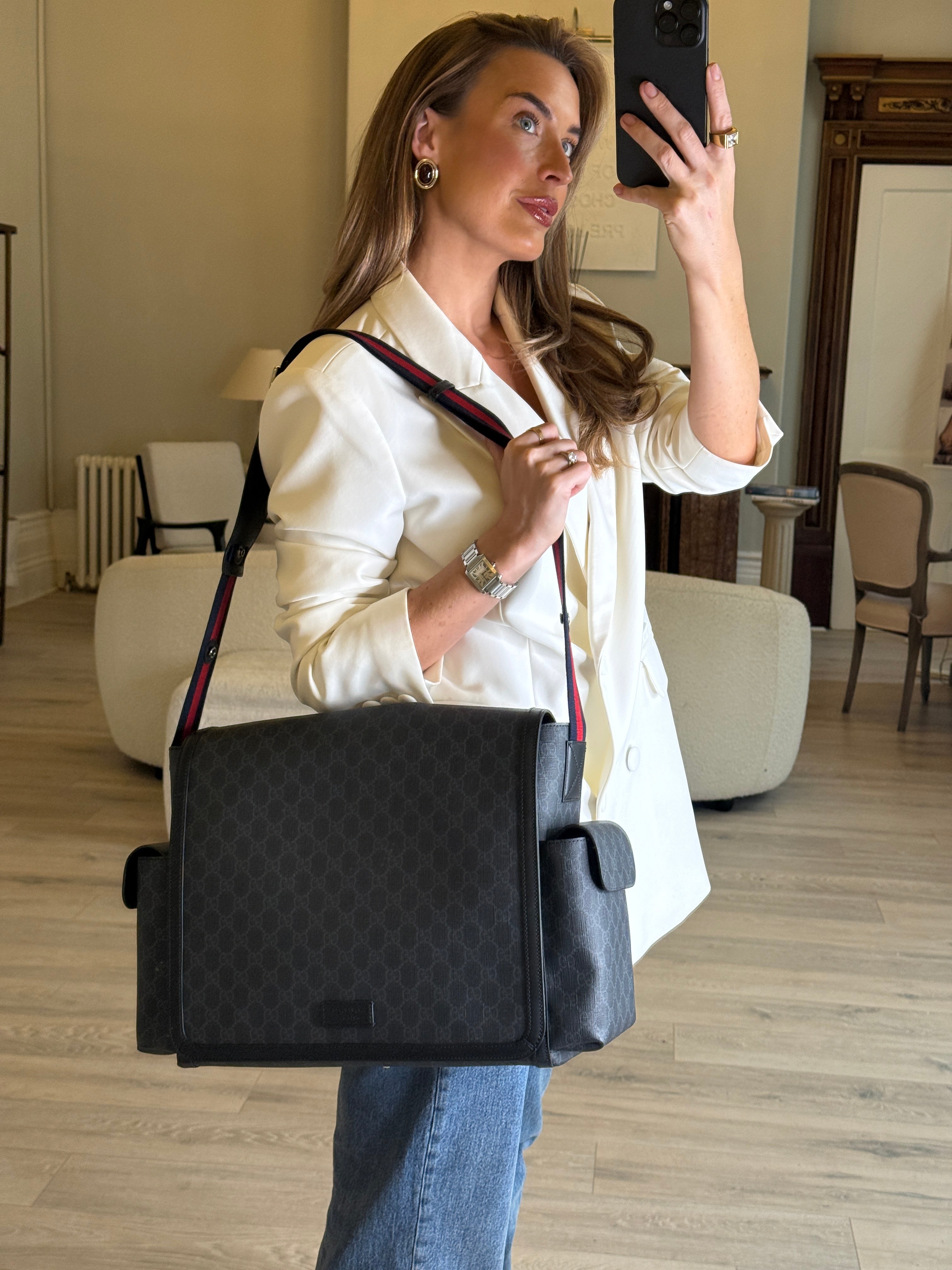 Authentic and preloved Gucci GG Supreme Medium Baby Changing Bag In Black Canvas. Excellent condition. 100% Authenticity guarantee 