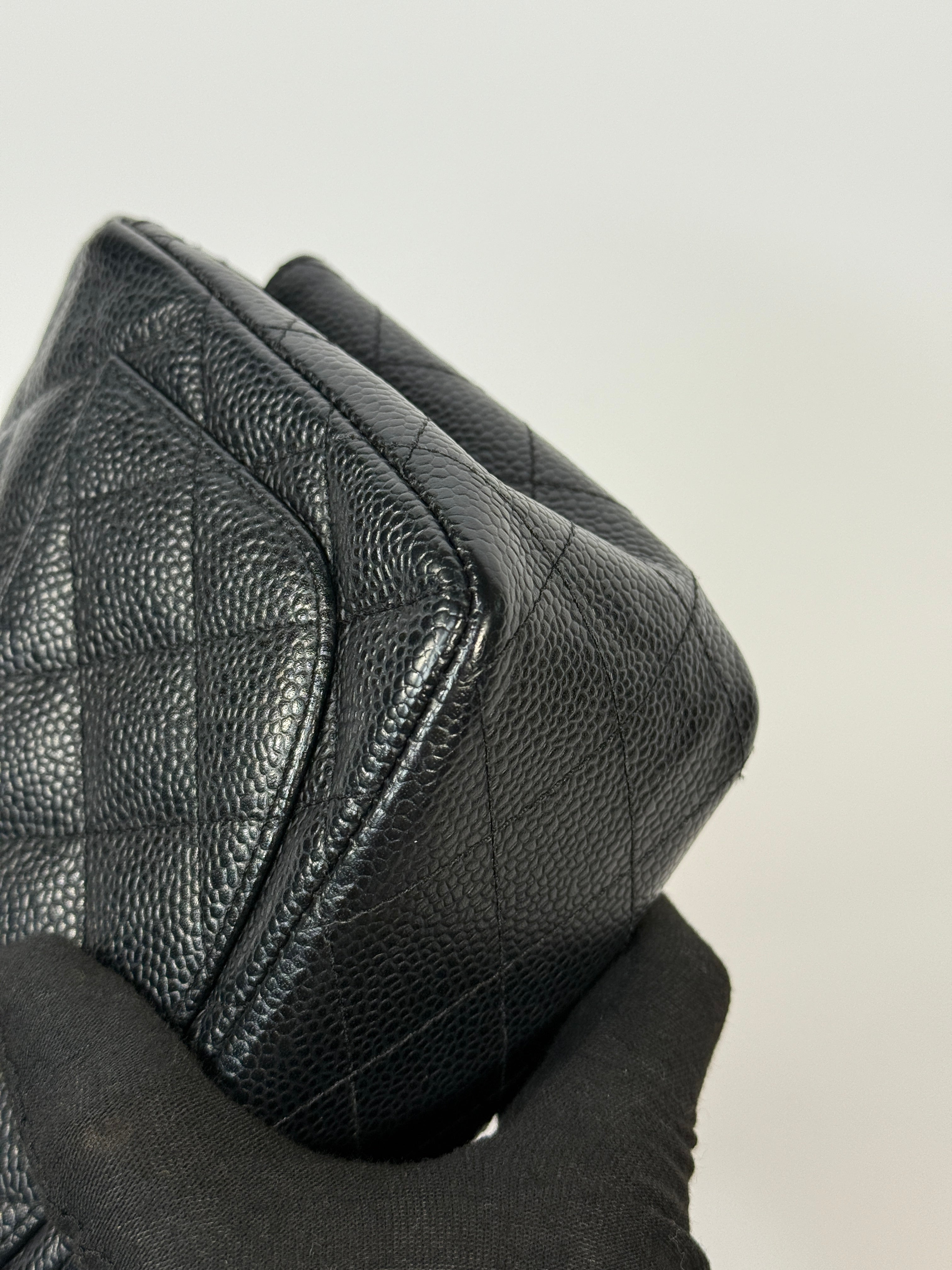 Chanel Black Square Flap Bag In Black Caviar Leather With Silver Hardware. Excellent condition. Authentic and preloved.