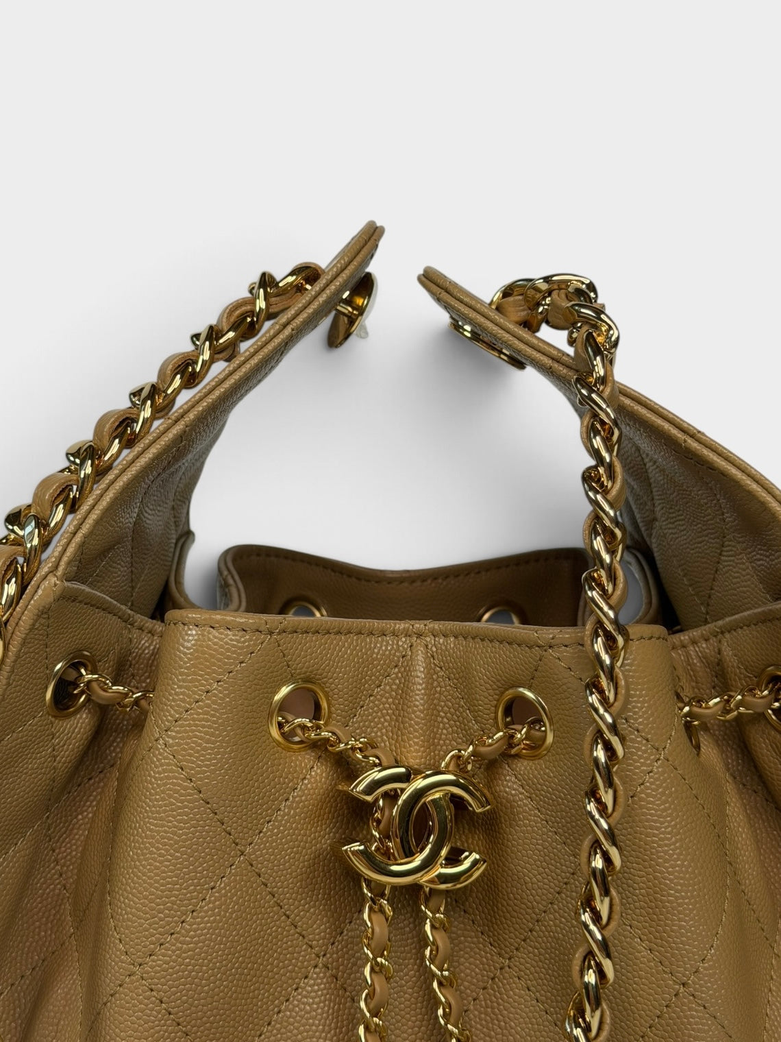 Chanel 25 Small In Brown Caviar Leather With Gold Hardware. 100% authentic and preloved in new and unused condition