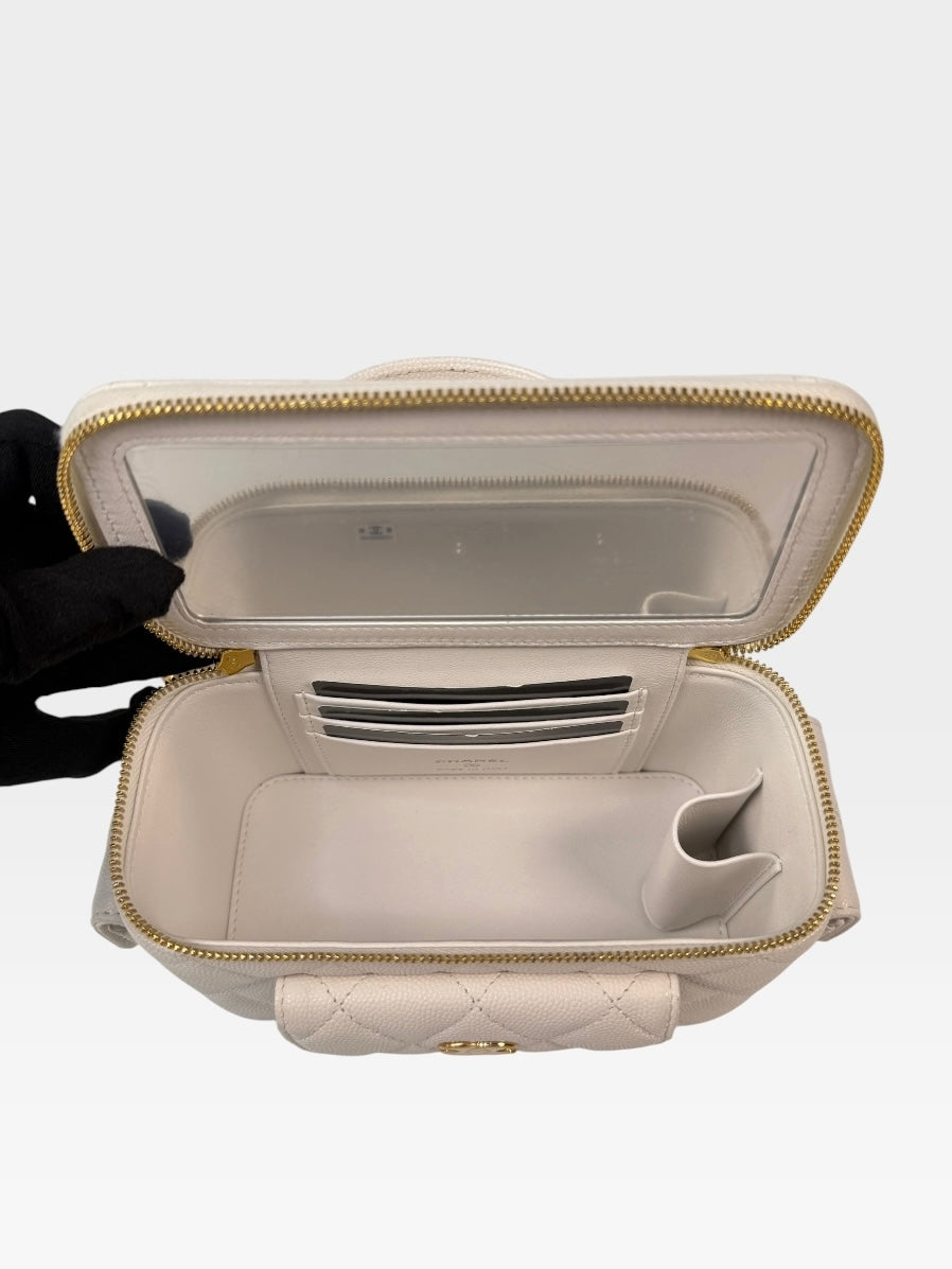 Chanel Vanity Top Handle  Multi Pockets In White Caviar Leather With Gold Hardware. 100% authentic and preloved in excellent condition